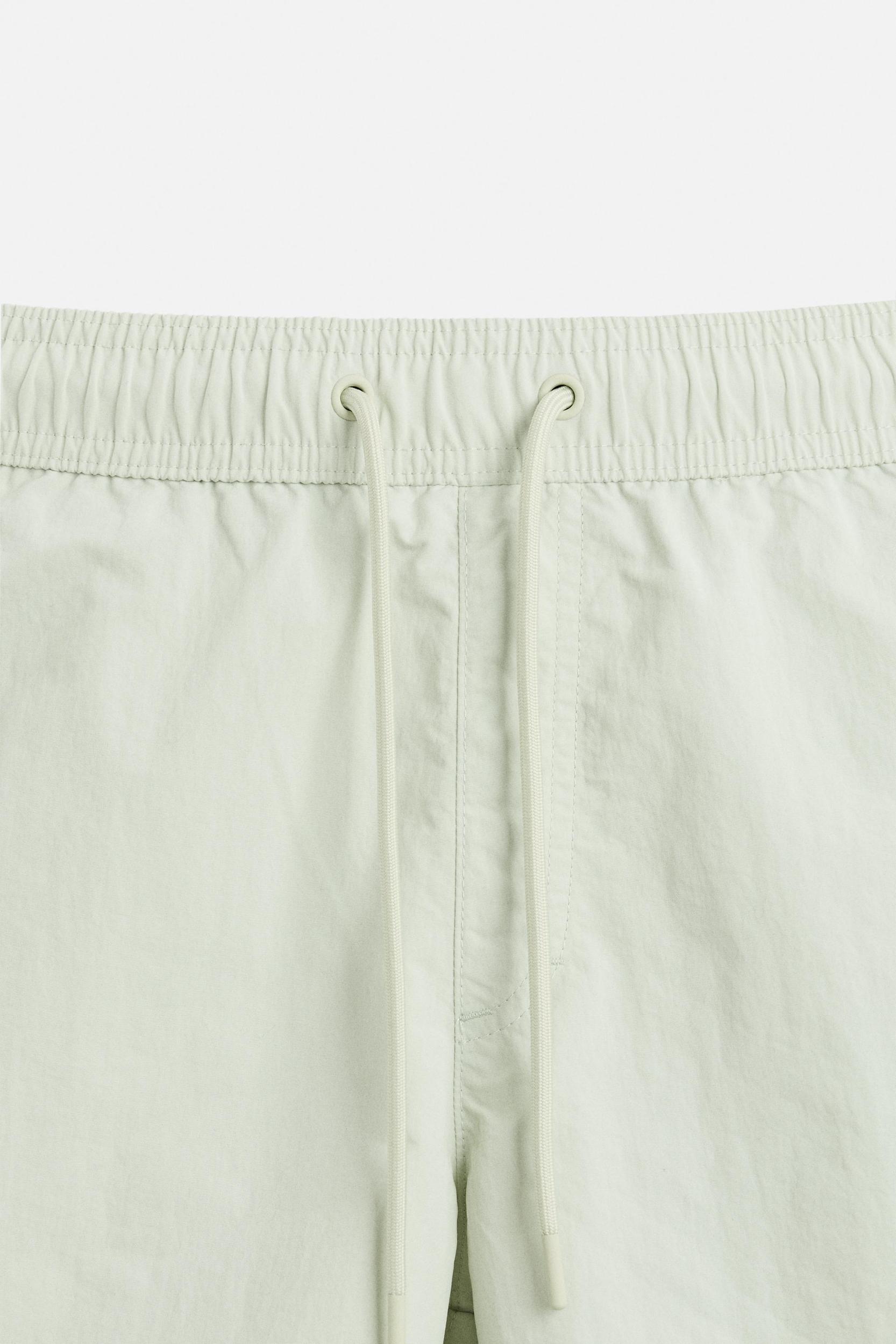 CONTRAST BANDS MID-LENGTH SWIMSUIT Product Image