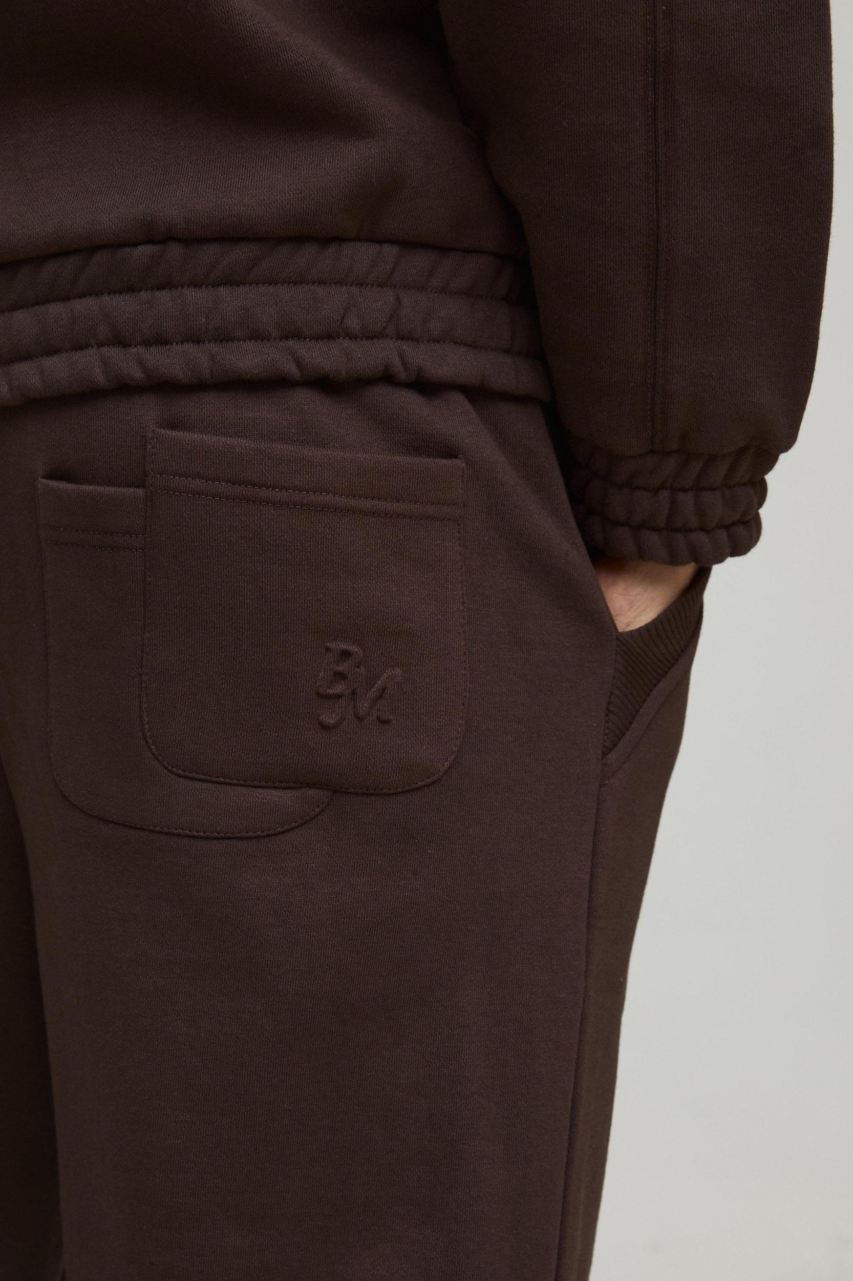 Relaxed Heavyweight Embossed Pocket Detail Split Hem Sweatpants | boohooMAN USA Product Image