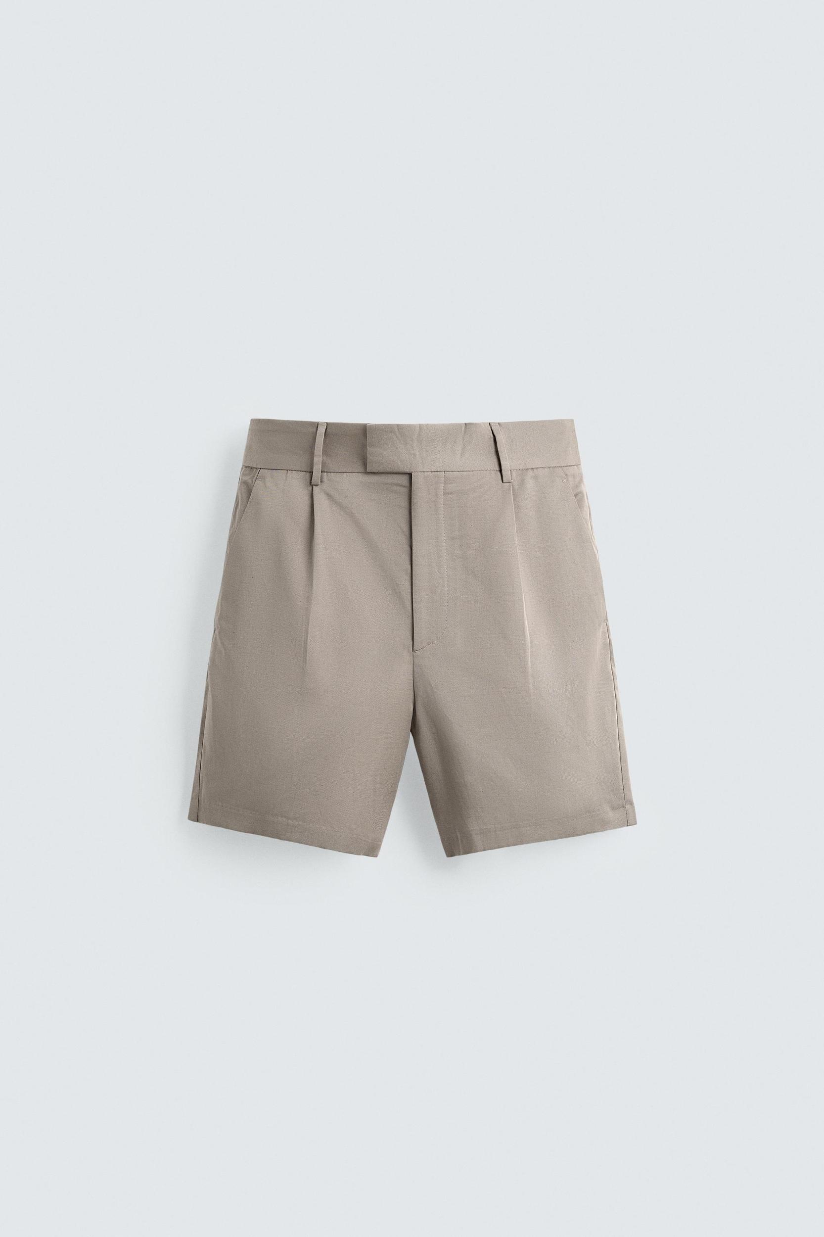 RELAXED FIT PLEATED SHORTS Product Image
