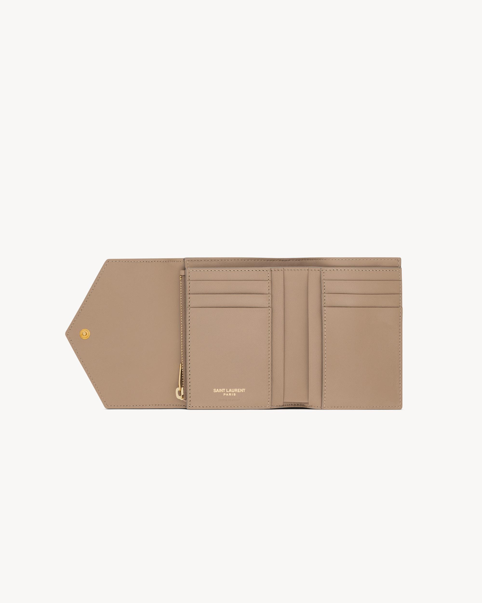 CASSANDRE MATELASSÉ compact tri fold wallet in grain de poudre leather Product Image