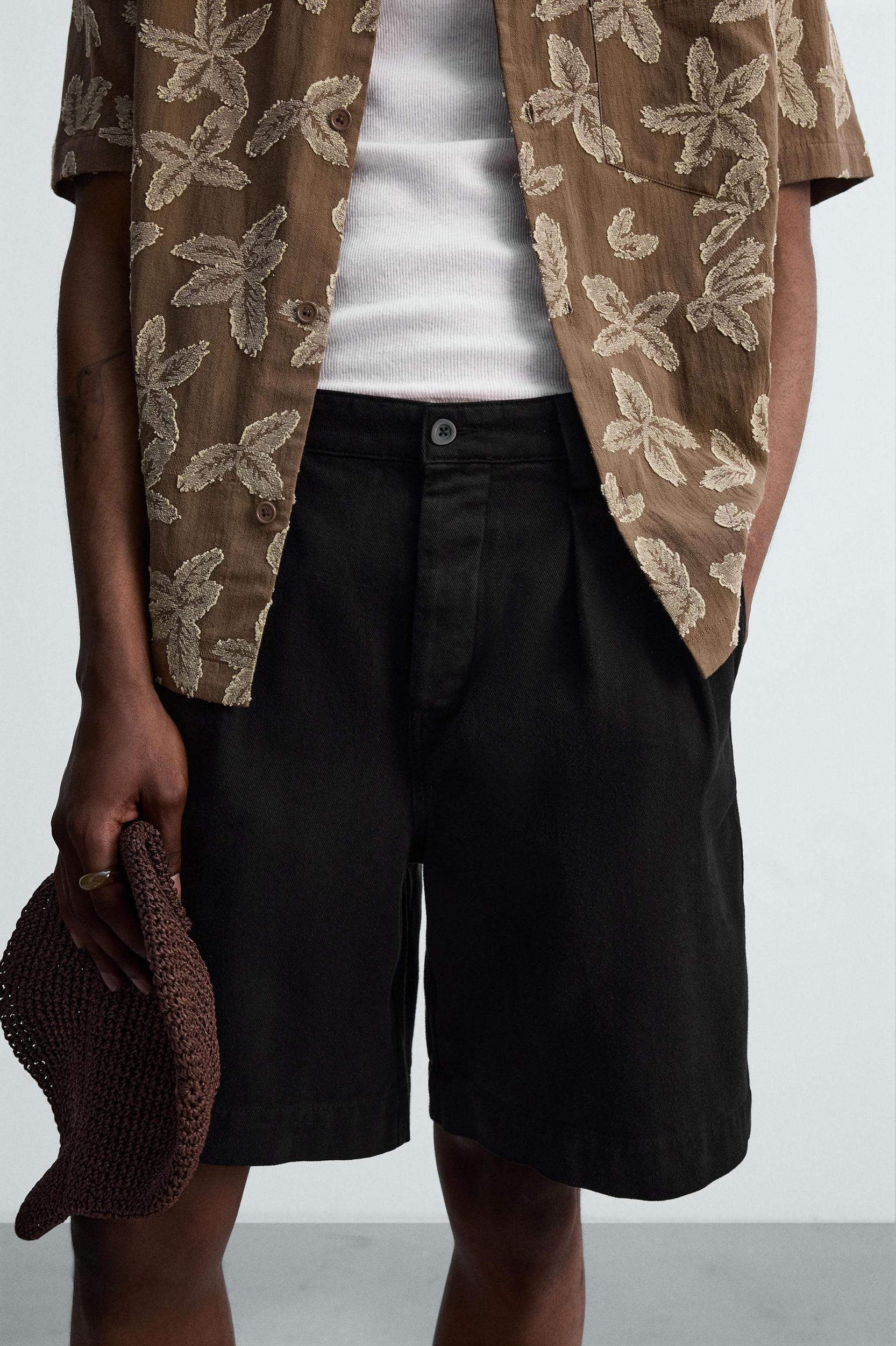 RELAXED FIT PLEATED BERMUDA SHORTS Product Image