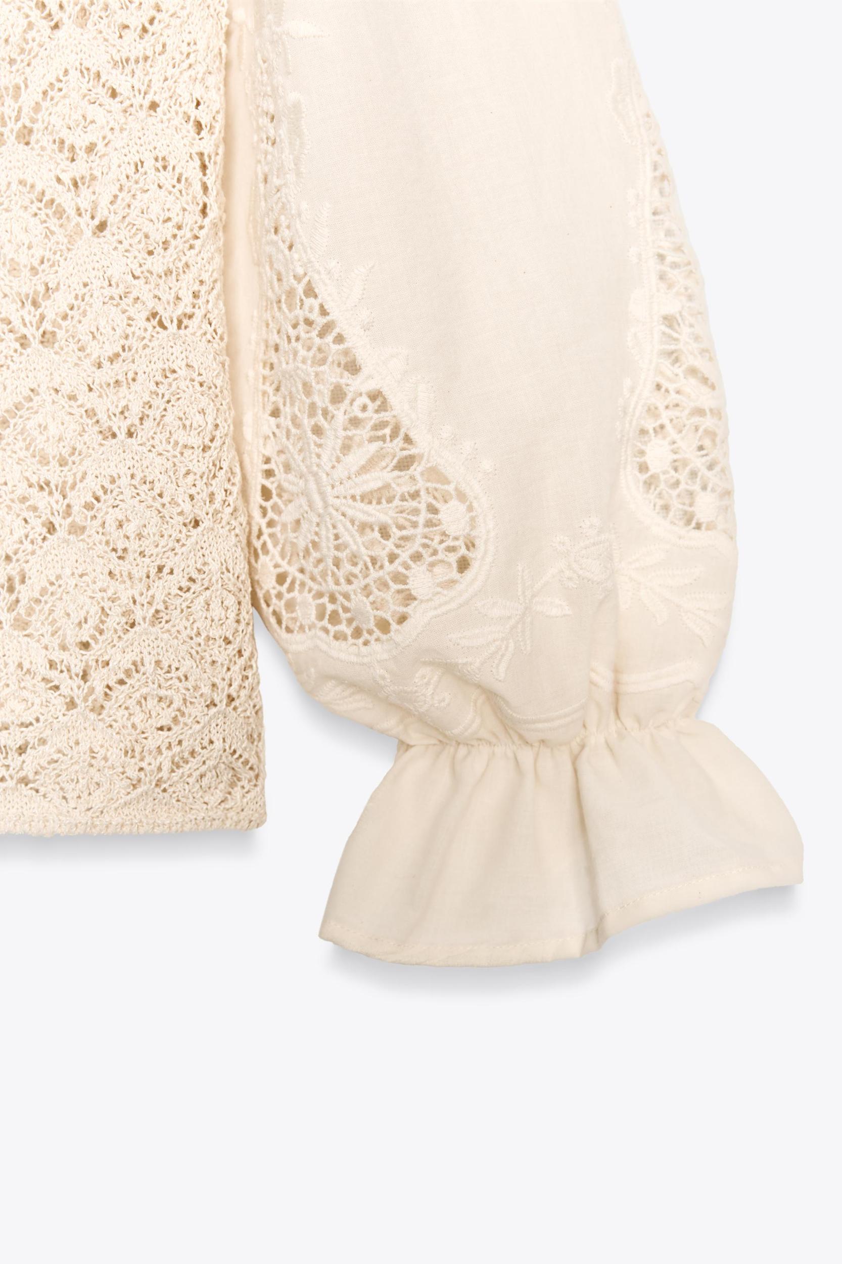 POINTELLE KNIT SWEATER WITH CONTRASTING SLEEVES Product Image