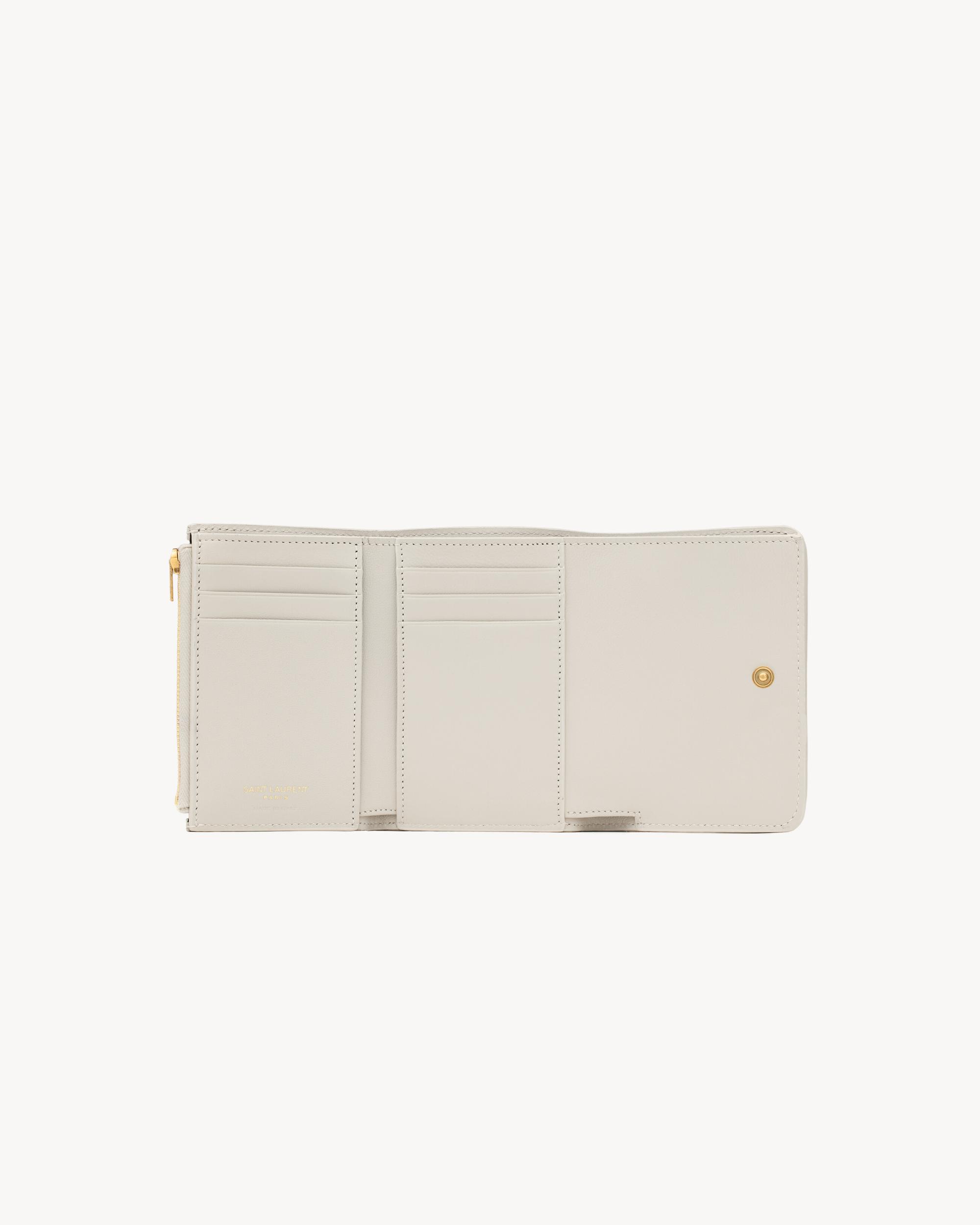 CASSANDRE multi-fold wallet in GRAIN DE POUDRE leather Product Image