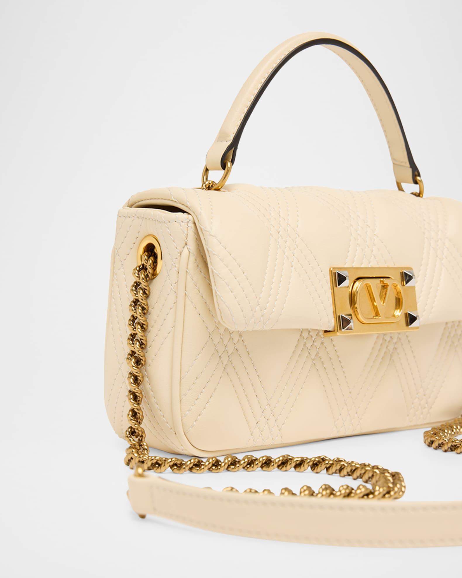 Rockstud Quilted Leather Top-Handle Bag Product Image