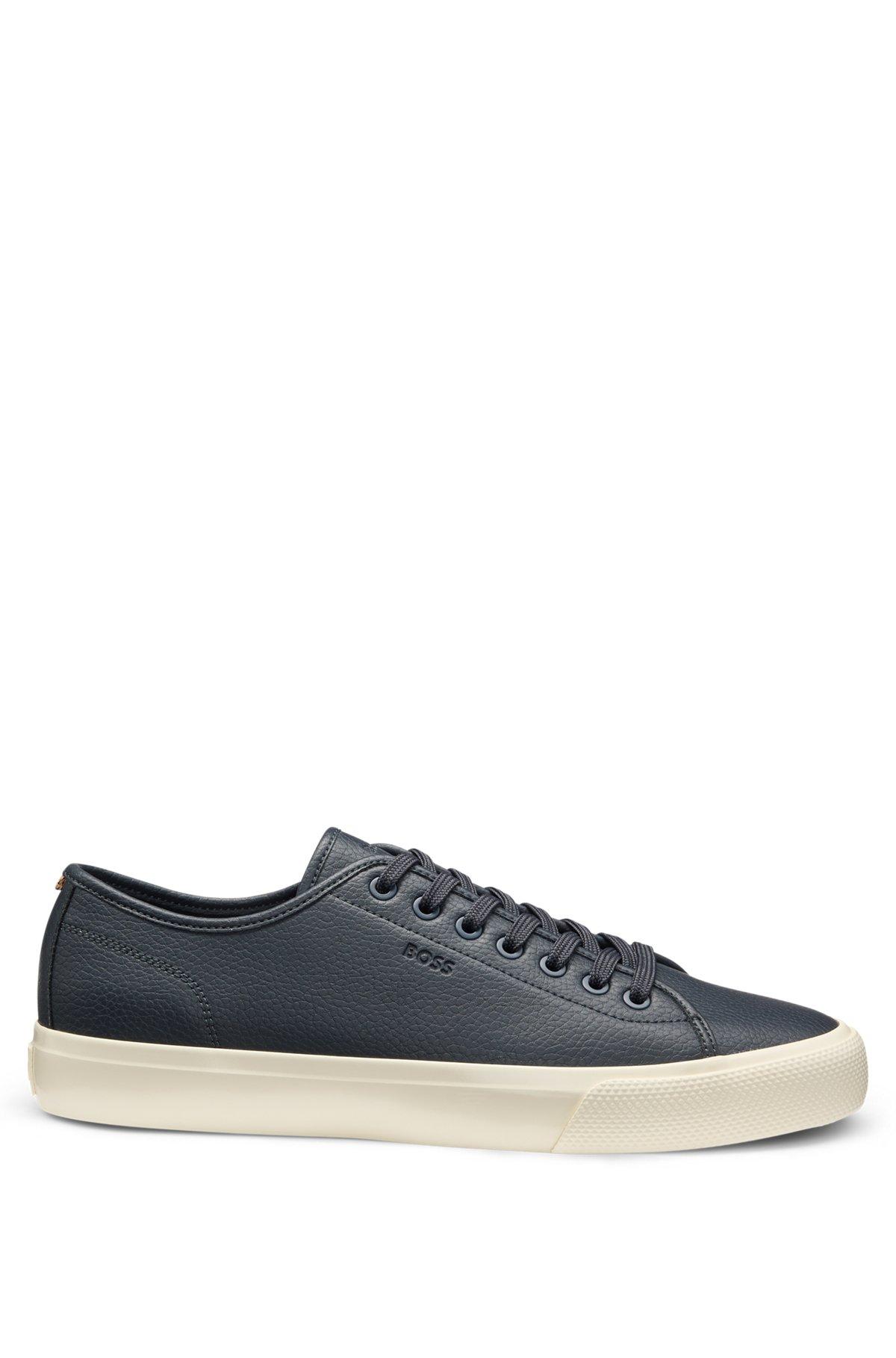 Low-top trainers in grained faux leather Product Image