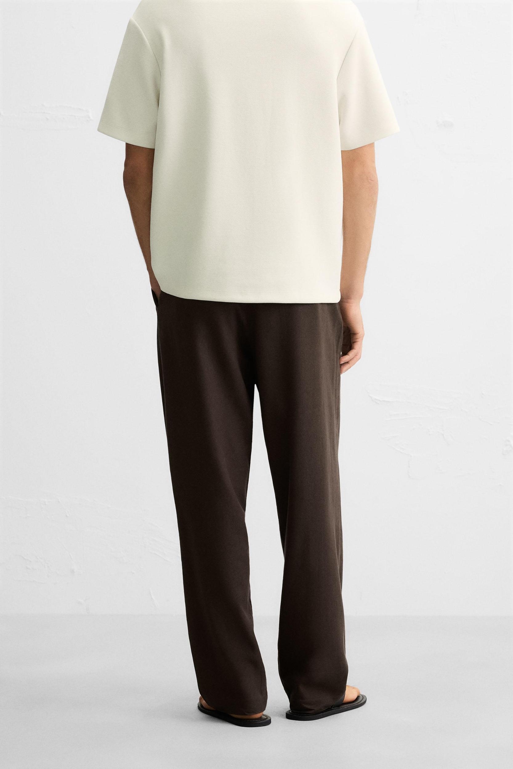 FLOWY PLEATED PANTS Product Image