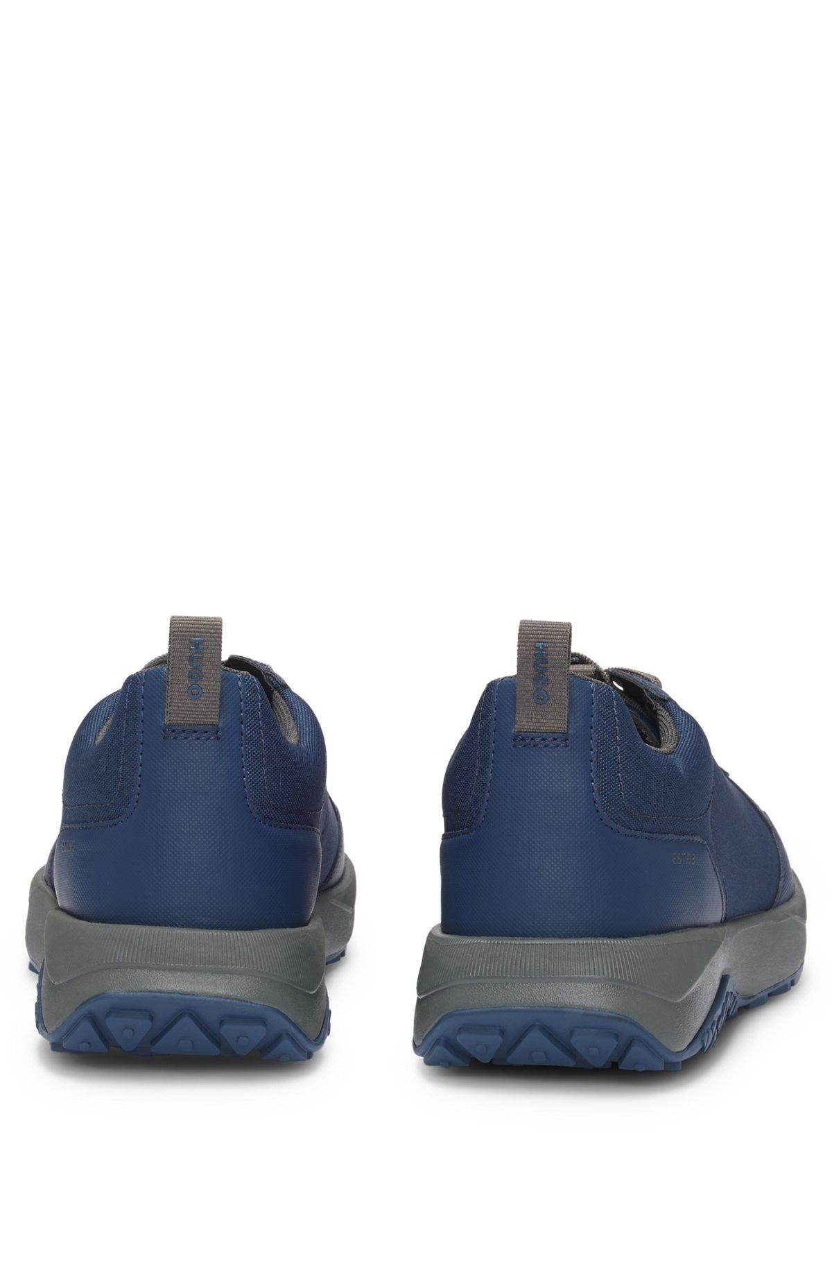 Mixed-material trainers with logo-tape trim Product Image