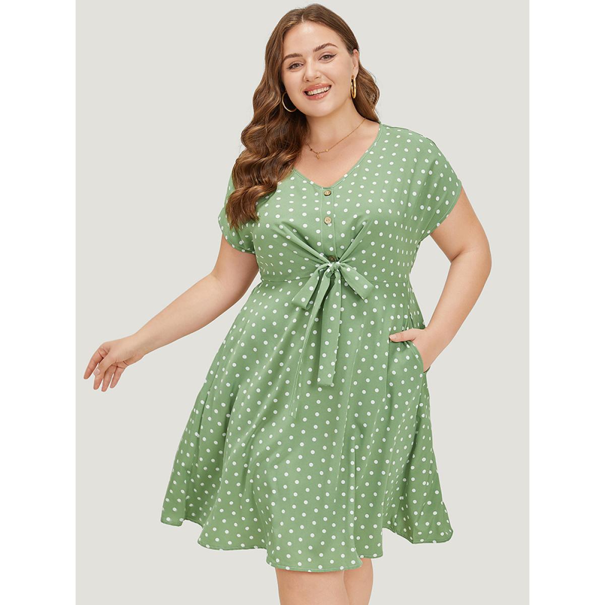 Plus Size Polka Dot Pocket Button Detail Twist Front Knee Dress Green Women Elegant Knotted V-neck Cap Sleeve Curvy Knee Dress BloomChic 14-16/1X Product Image