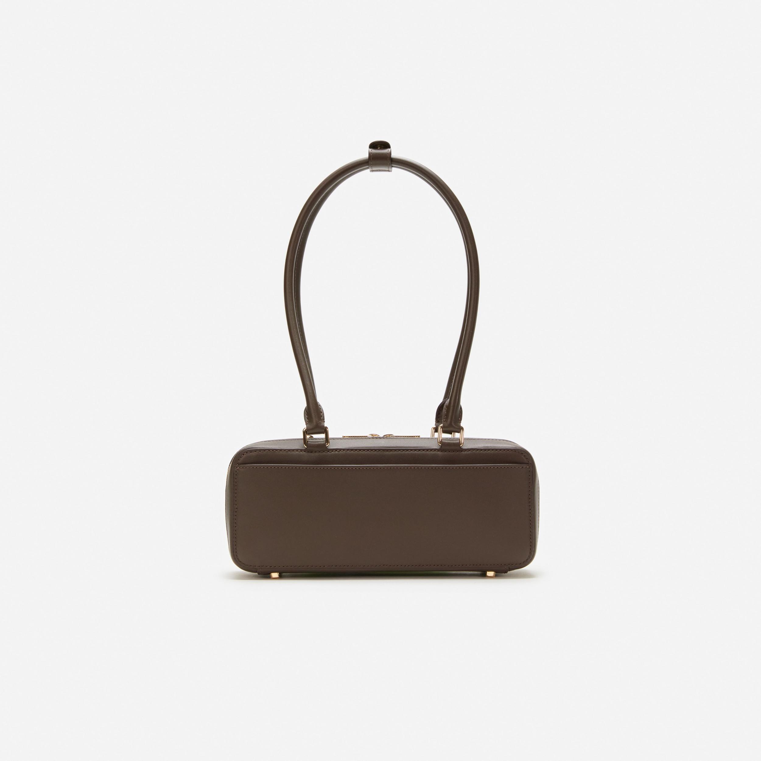 Brown Leather Baguette Shoulder Bag With Charm Product Image