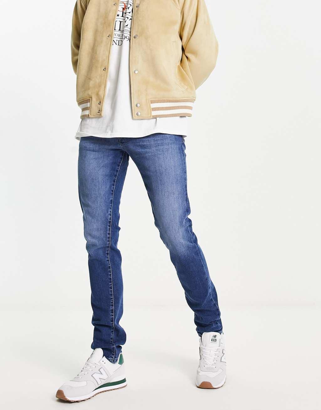 Scalpers slim jeans in medium blue Product Image