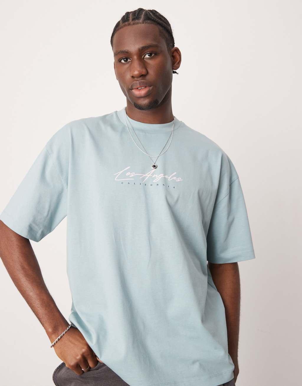 ASOS DESIGN oversized T-shirt with floral graphic in light blue Product Image