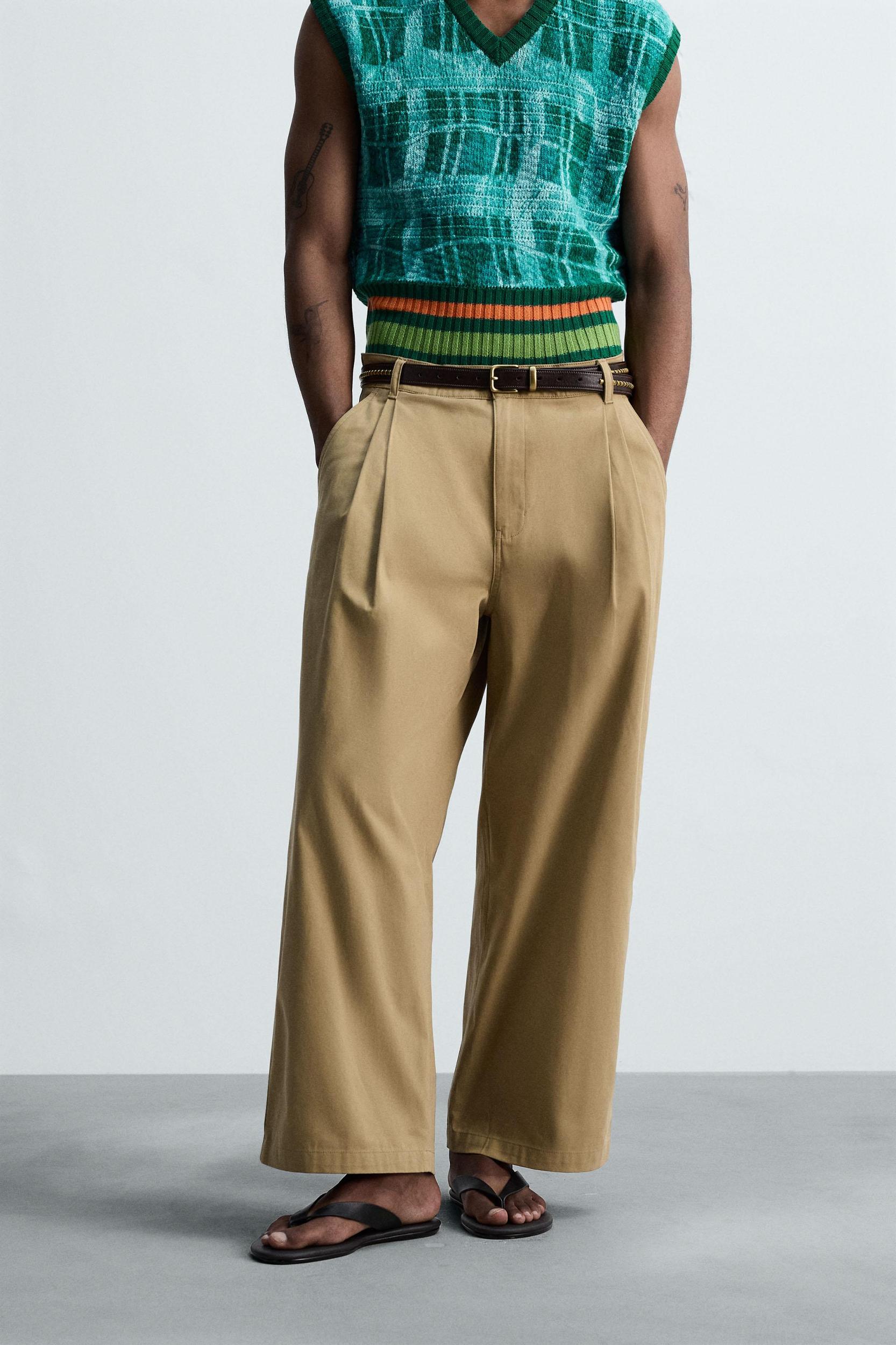 PLEATED WIDE FIT PANTS Product Image