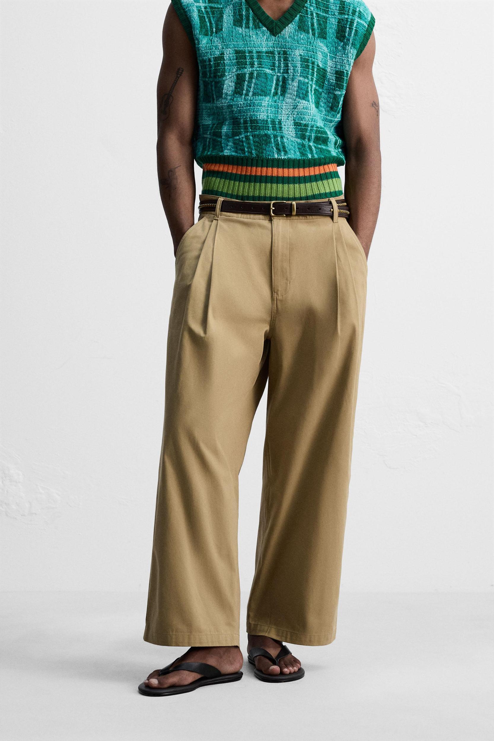 PLEATED WIDE FIT PANTS Product Image