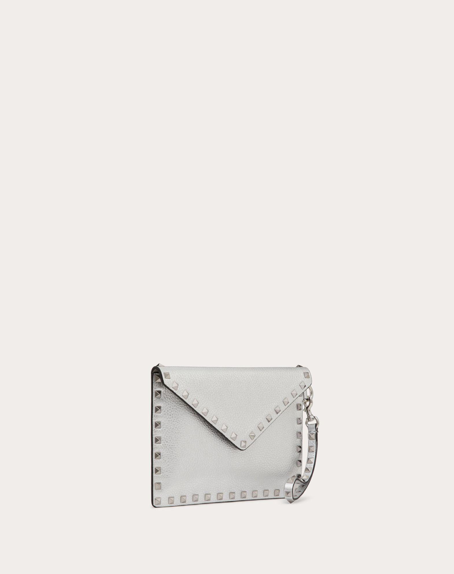 ROCKSTUD METALLIC GRAINY CALFSKIN CLUTCH BAG Product Image