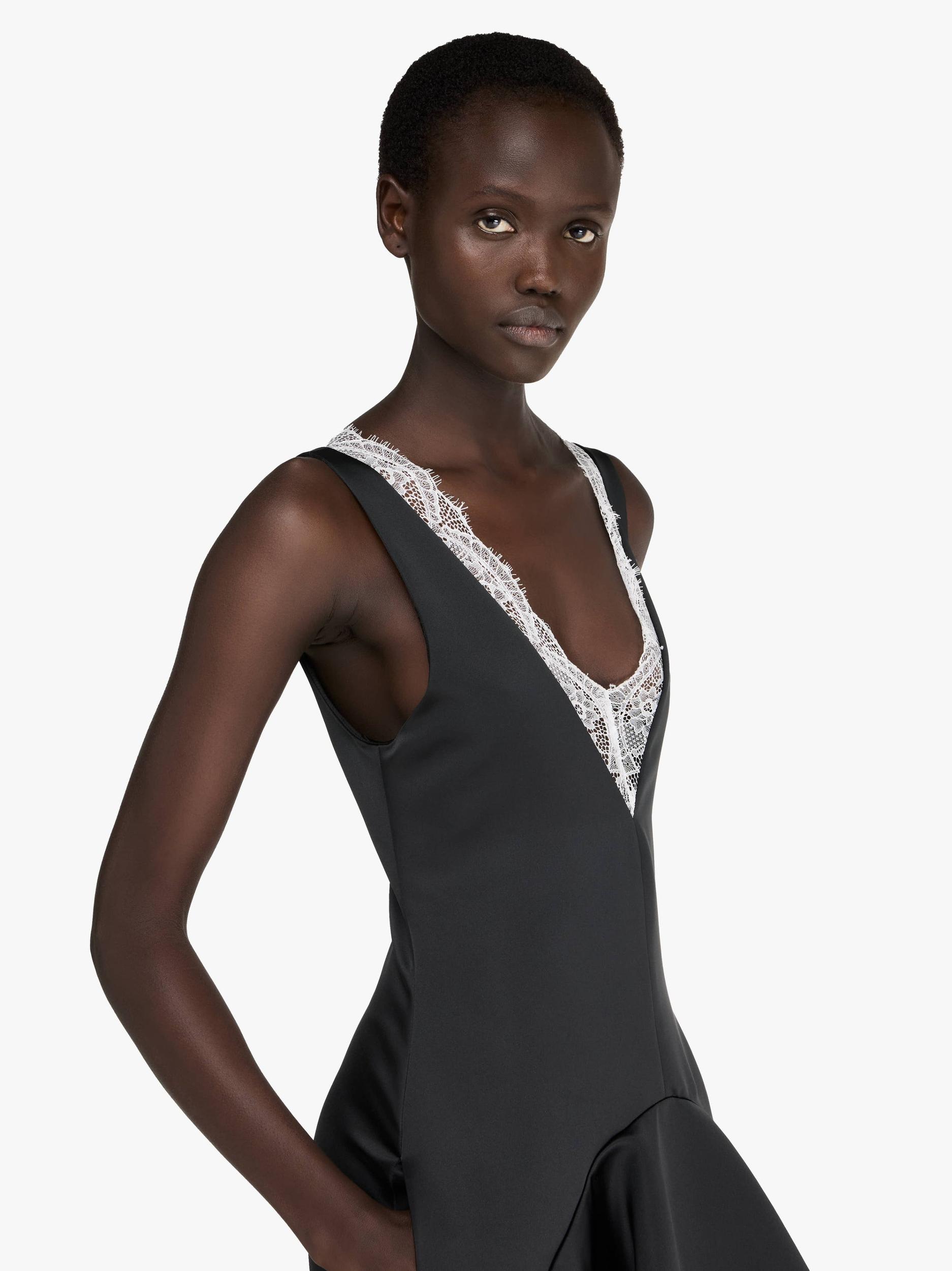 DRAPED HEMLINE V-NECK DRESS Product Image