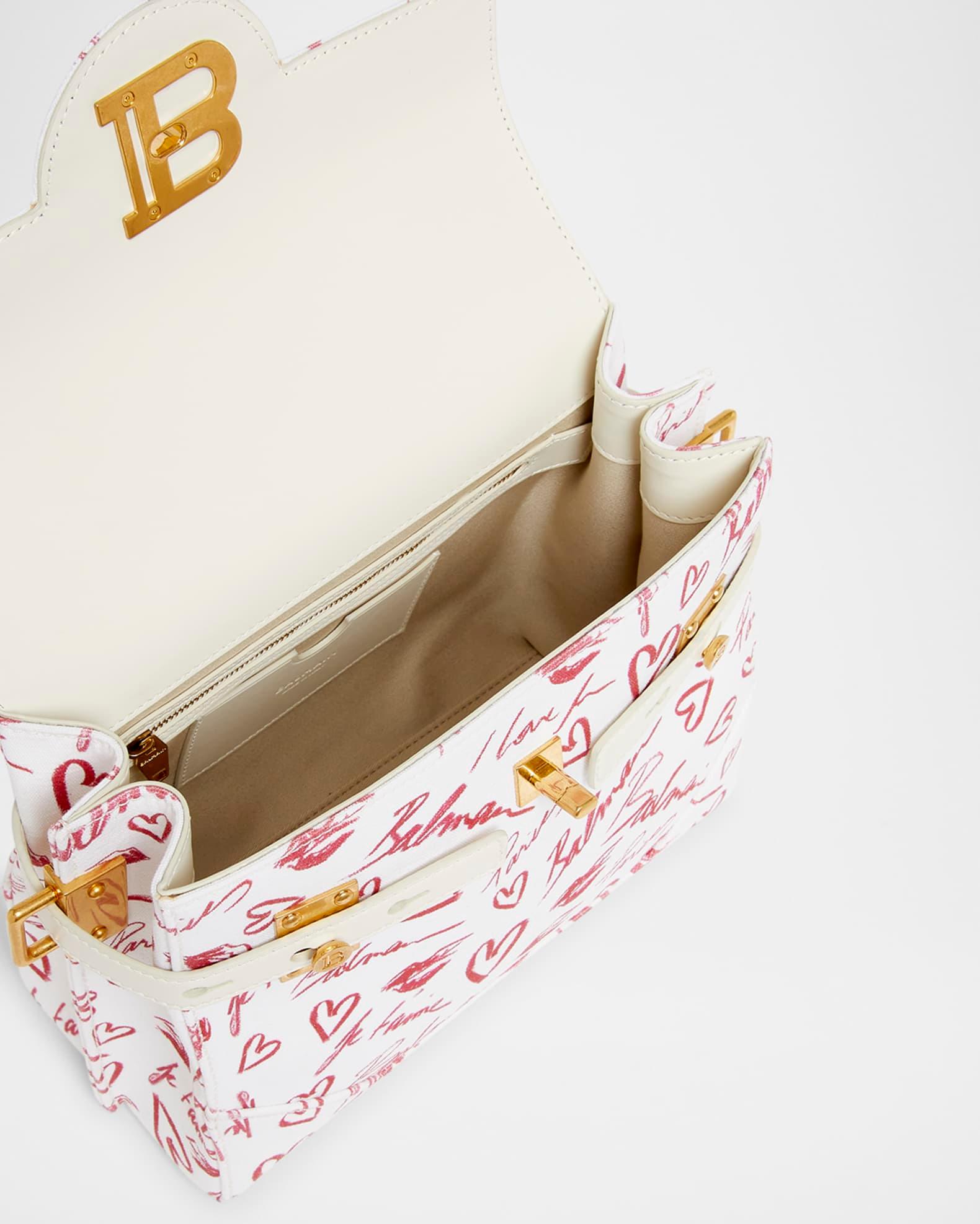 B-Buzz 23 Top-Handle Bag in Lipstick-Print Canvas  Product Image