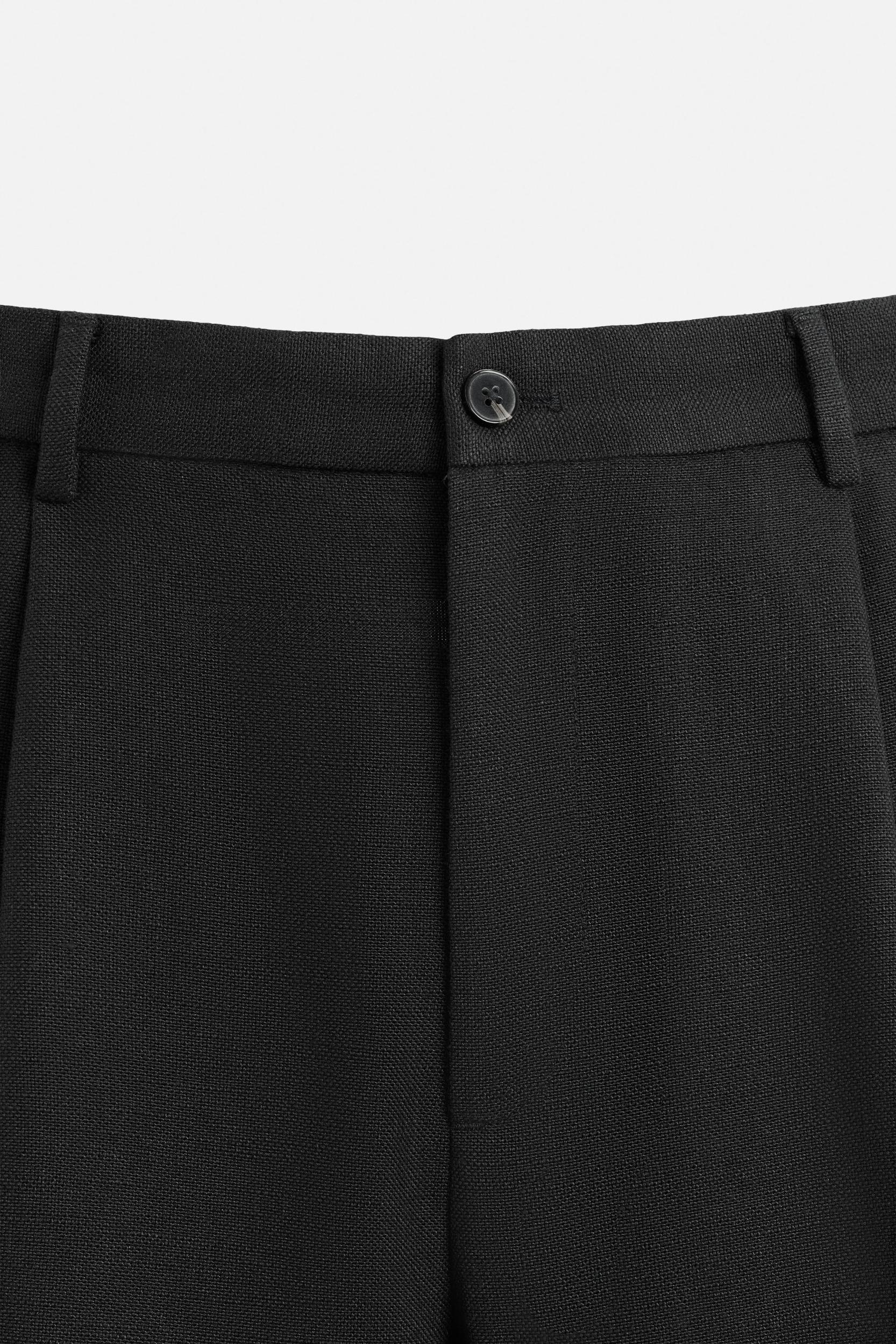 PLEATED RELAXED FIT PANTS Product Image