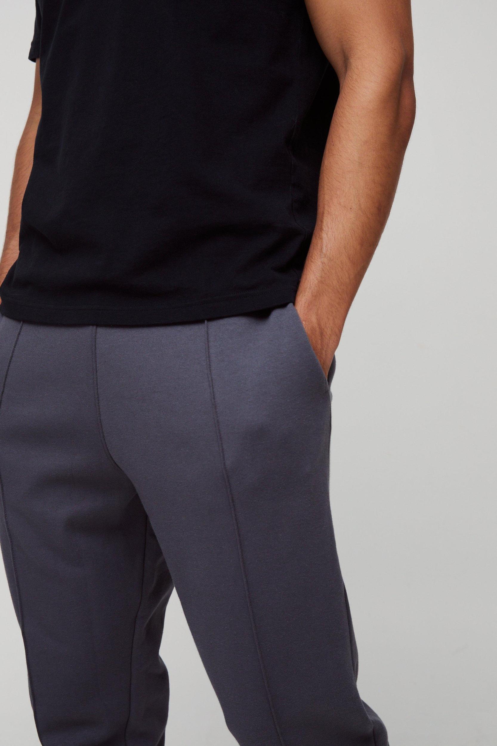 Slim Tapered Heavyweight Interlock Sweatpants | boohooMAN USA Product Image