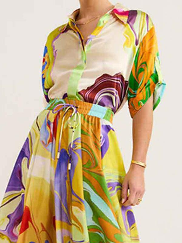 Loose Asymmetric Printed Lapel Blouse + A-Line Drawstring Elasticity Skirt Two Pieces Set Product Image