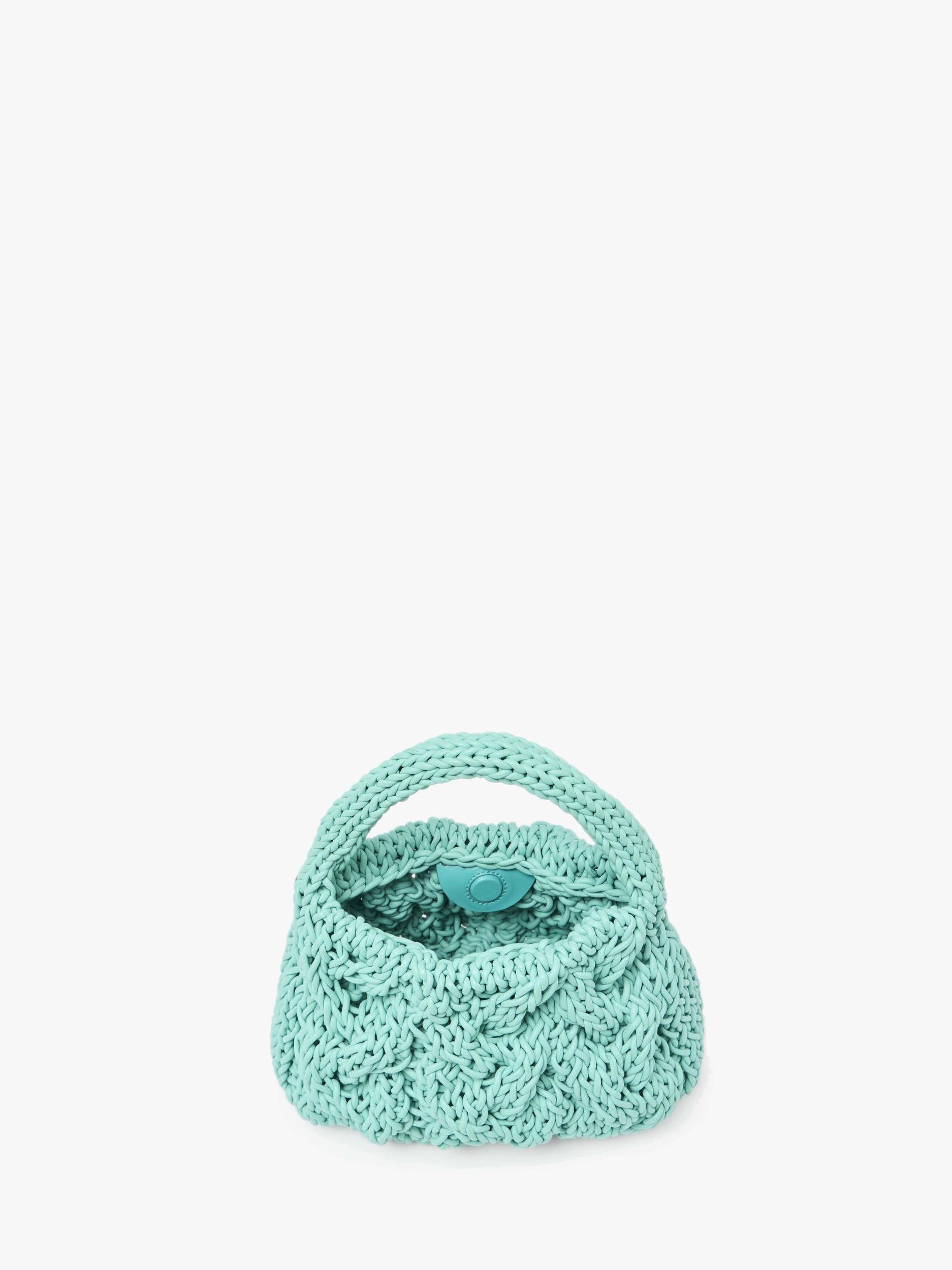 SMALL CABLE KNIT BAG - LEATHER DRAWCORD TOP HANDLE BAG Product Image