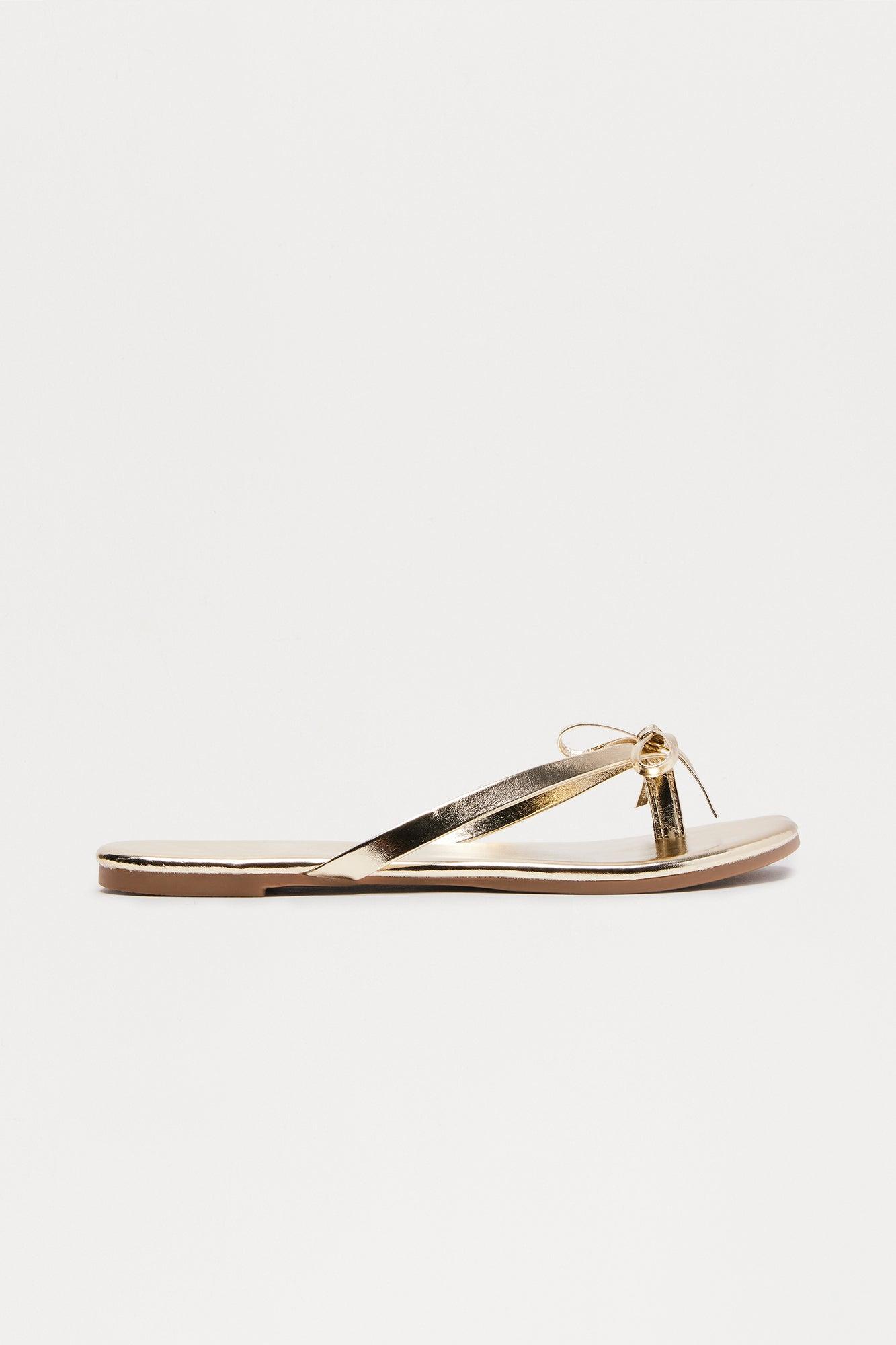 Coral Bow Flip Flops - Gold Female Product Image