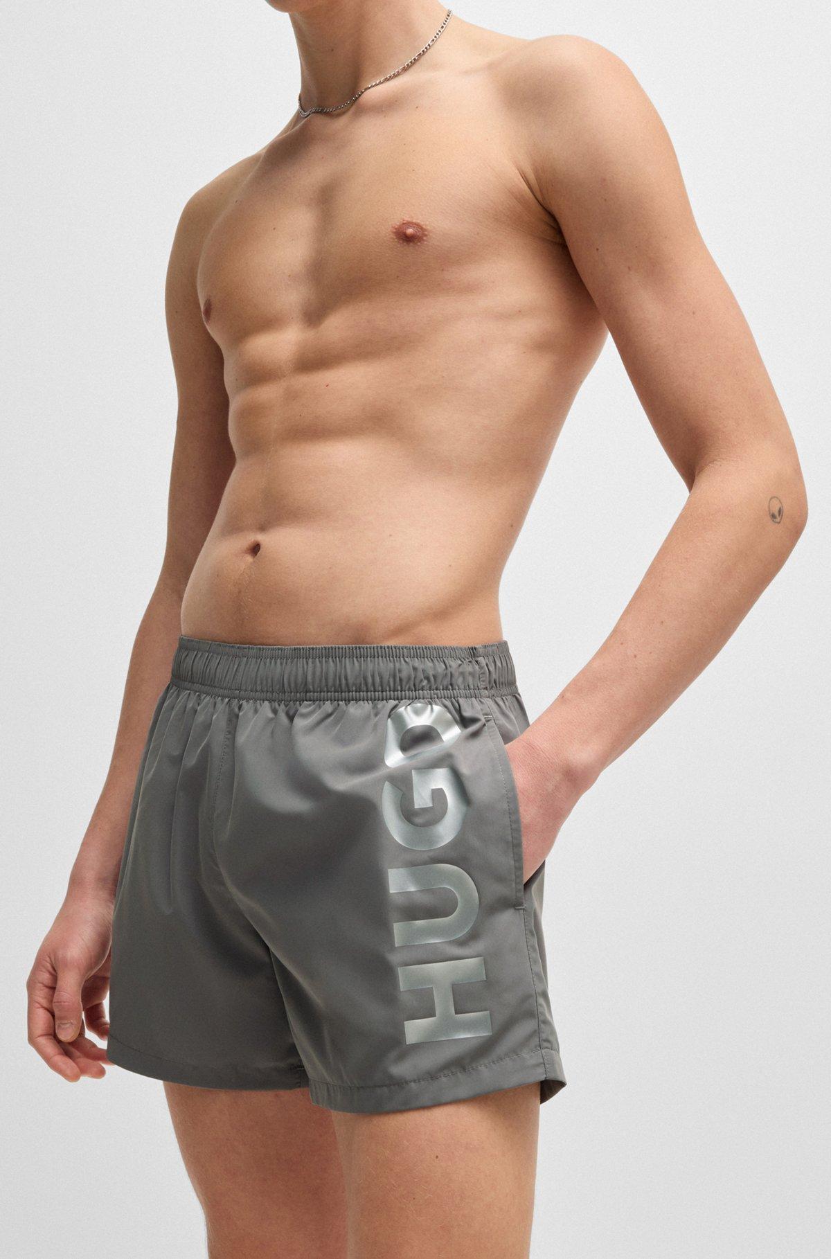 Fully lined swim shorts with vertical logo Product Image