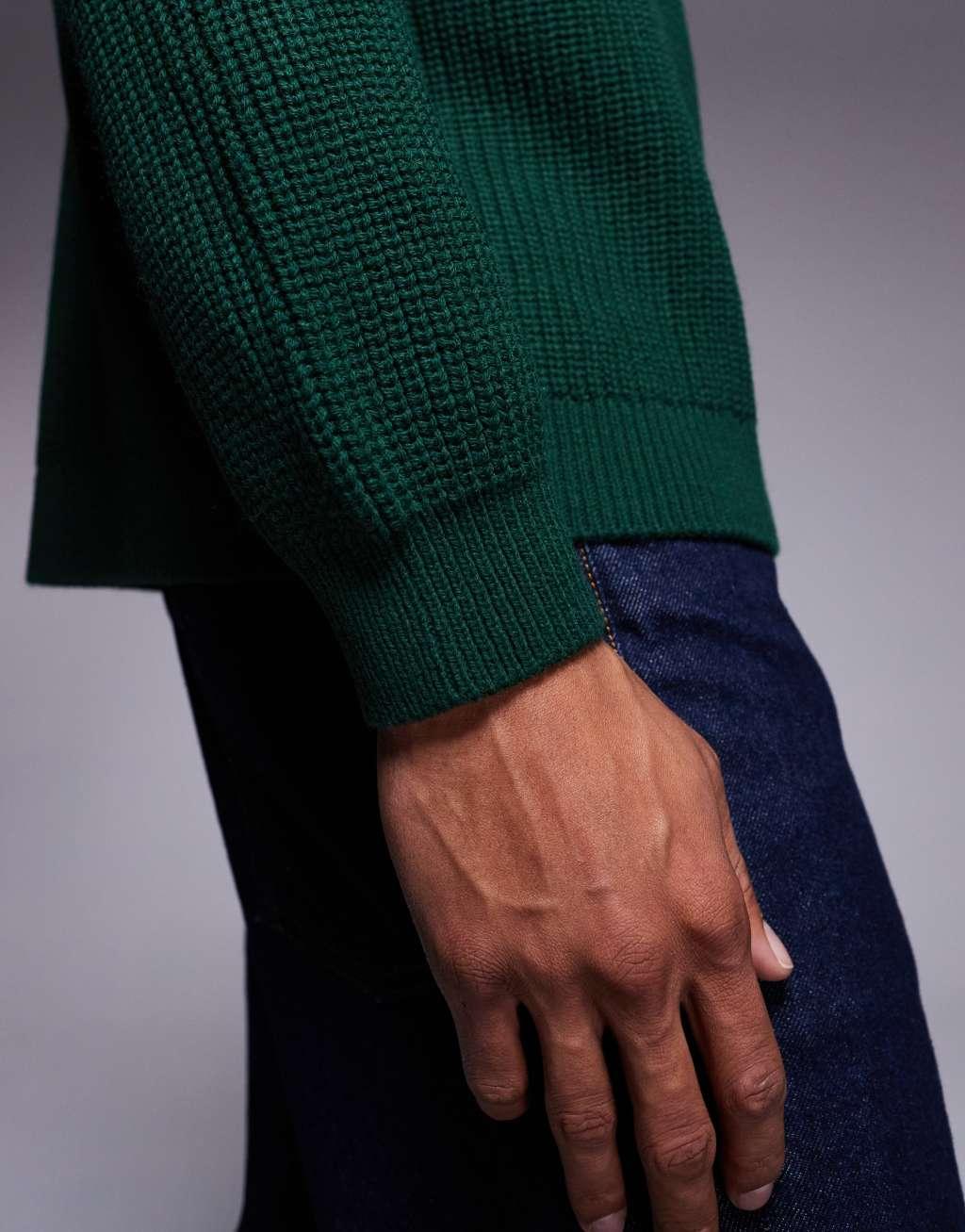 ASOS DESIGN oversized boxy knitted fisherman rib sweater in dark green Product Image