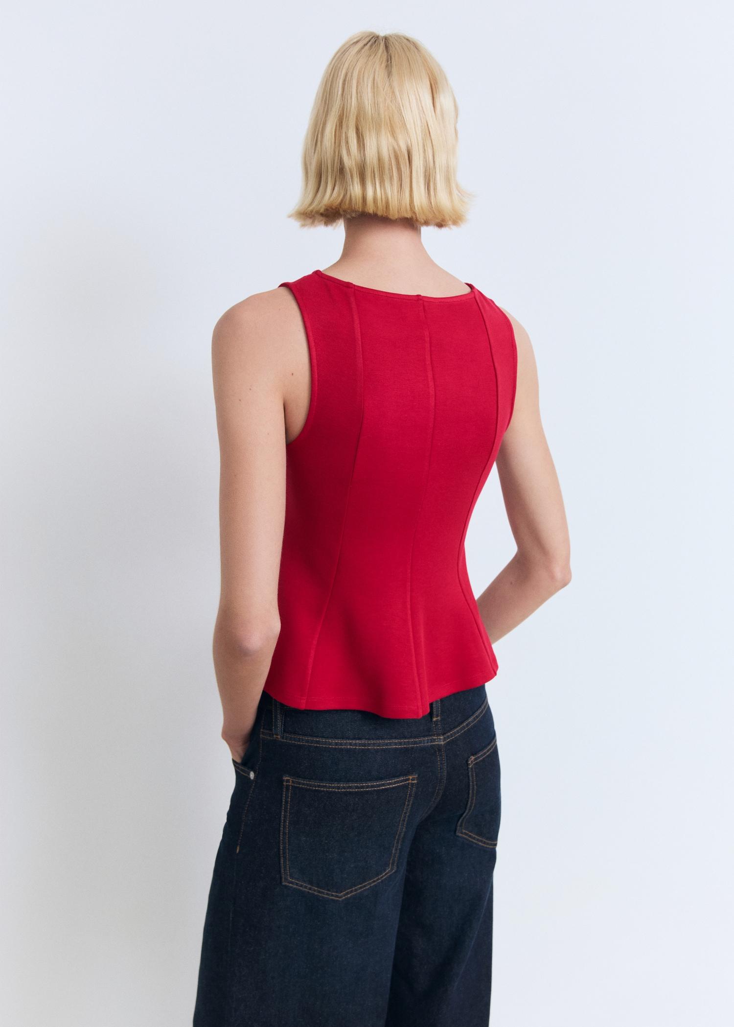 Peplum top with seam detail - Women | MANGO USA Product Image
