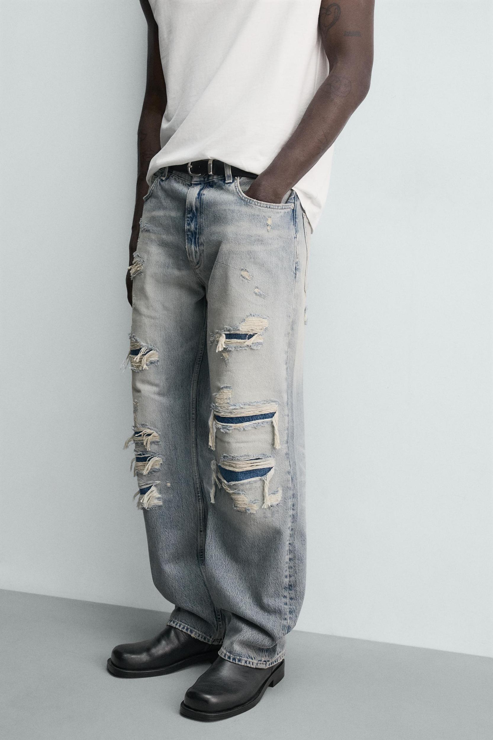LOOSE FIT RIPPED JEANS Product Image