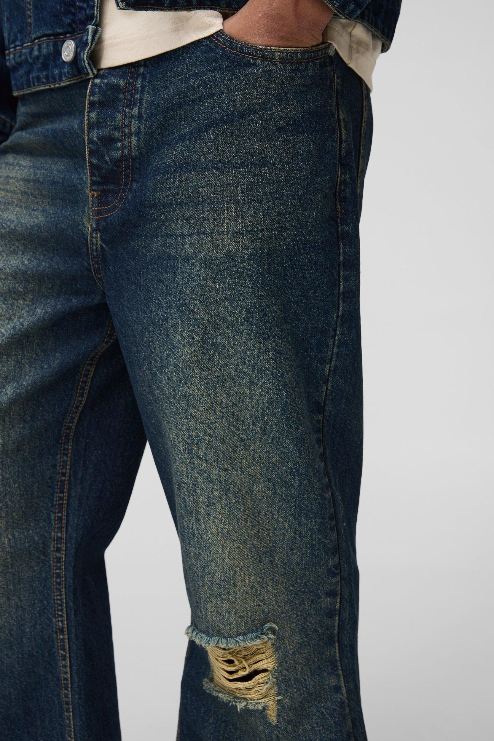 Relaxed Flare Antique Wash Ripped Knee Jeans | boohooMAN USA Product Image