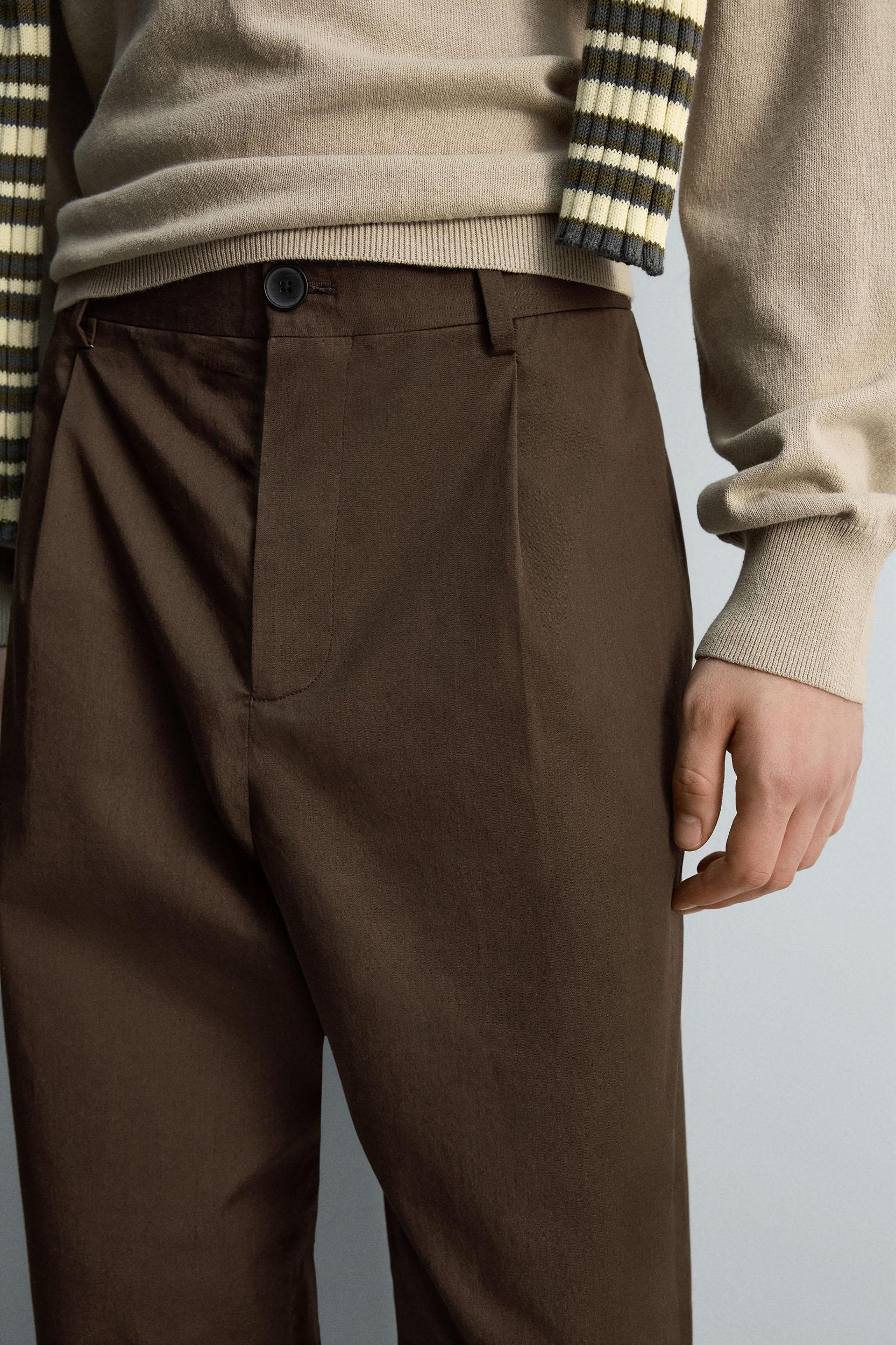LIMITED EDITION PLEATED CHINO PANTS Product Image