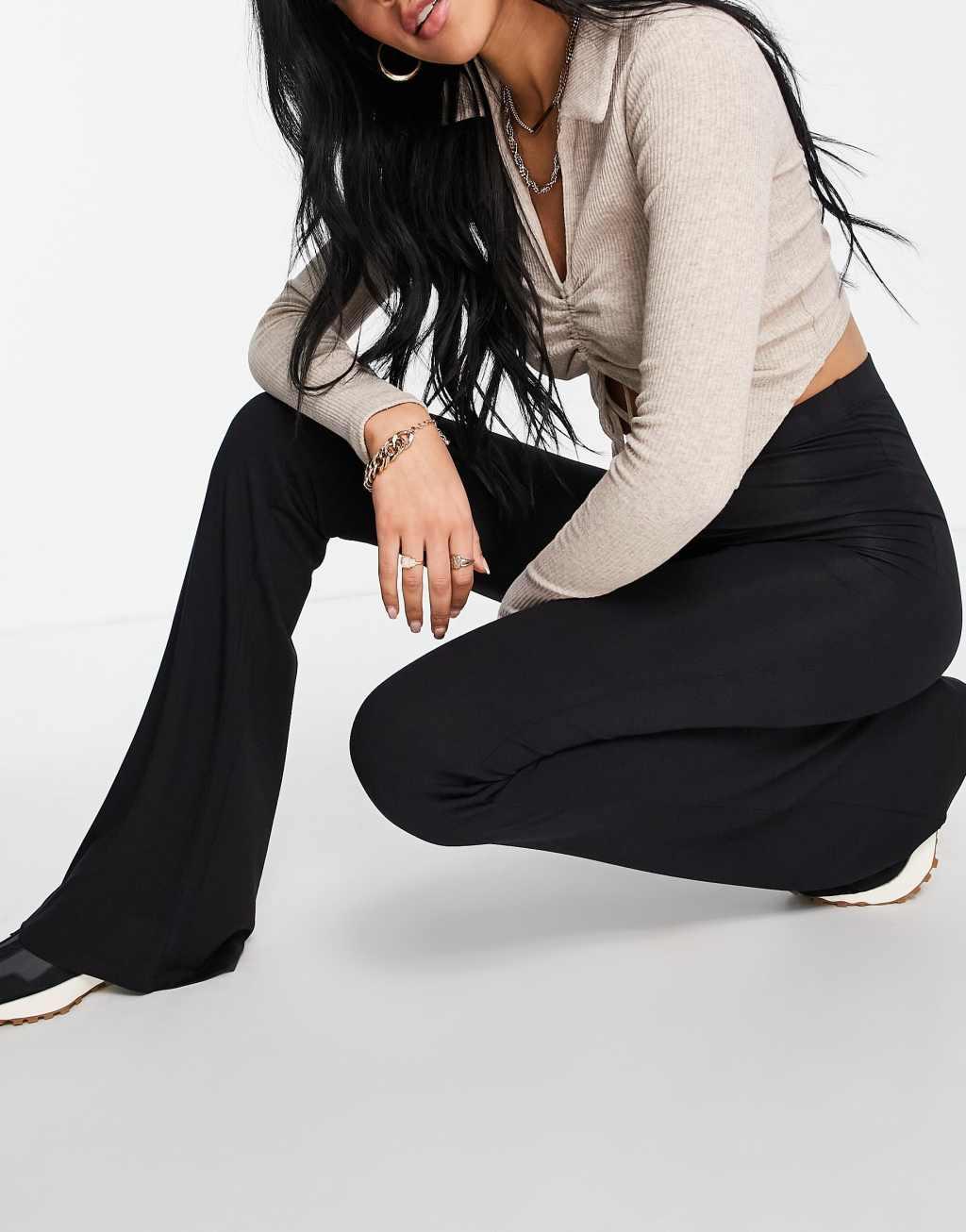 ASOS DESIGN Tall kick flare pants in black Product Image