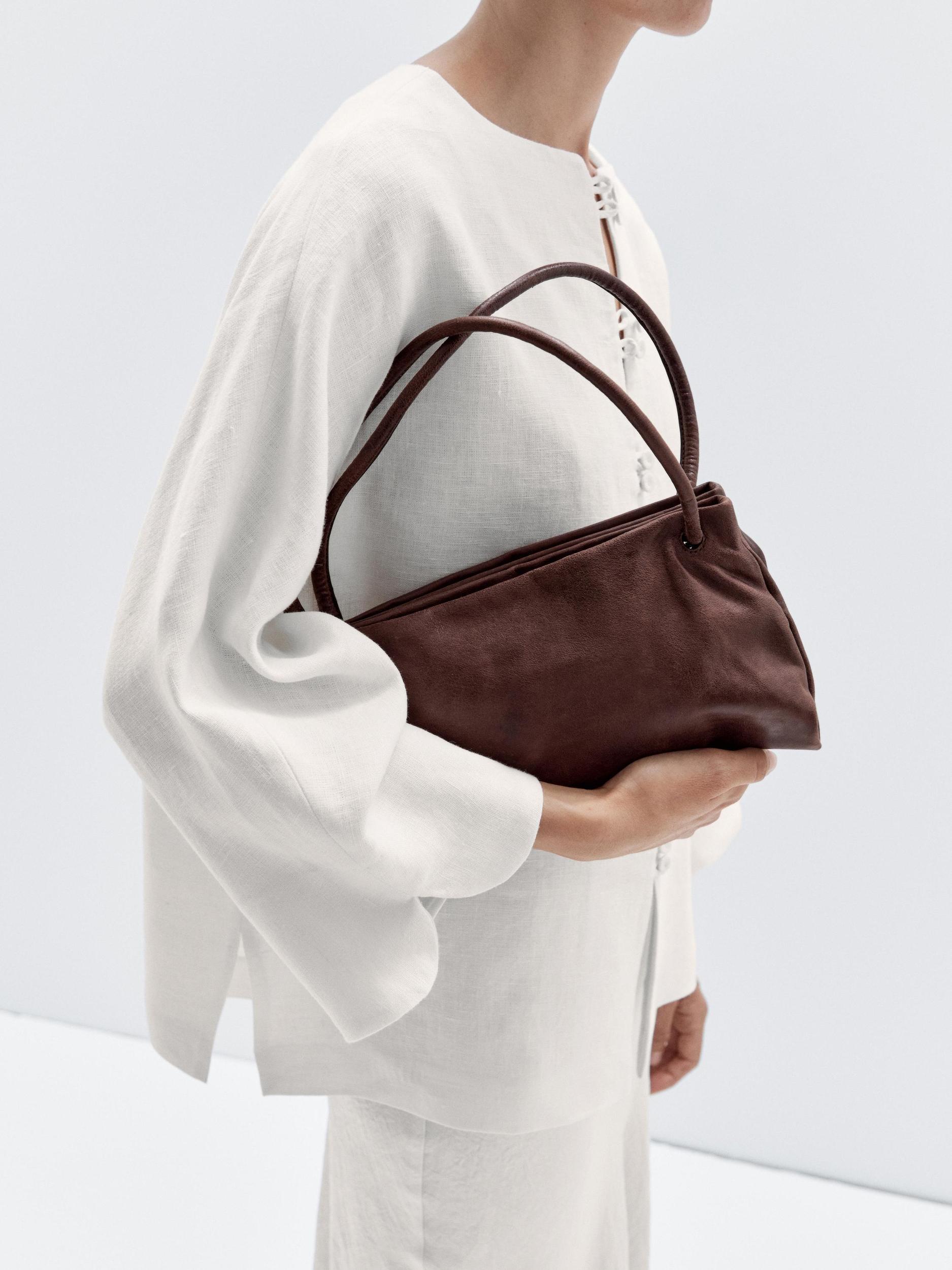 Small nappa leather bag with compartments Product Image