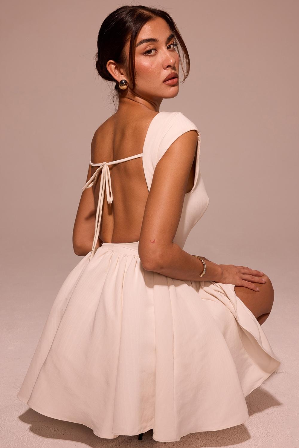 Enchant  white open back mini dress Product Image