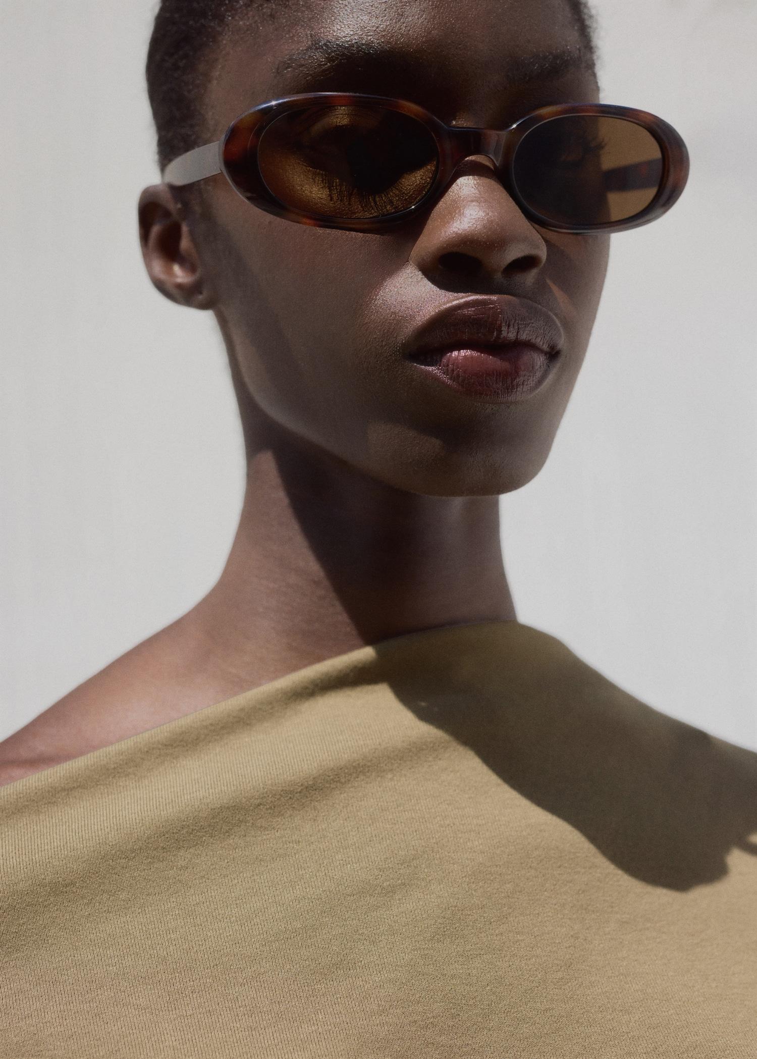 Cotton top with asymmetrical neck - Women | MANGO USA Product Image