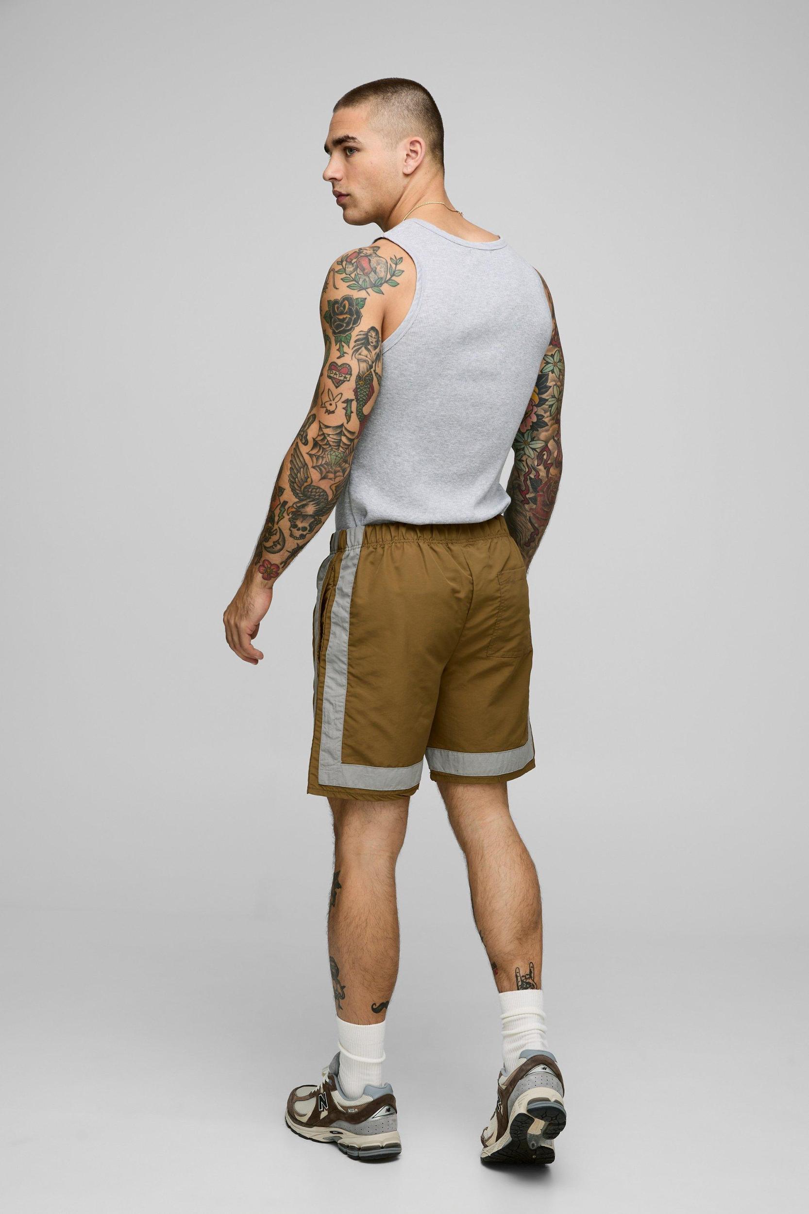 Elasticated Waist Relaxed Crinkle Nylon Colour Block Shorts | boohooMAN USA Product Image