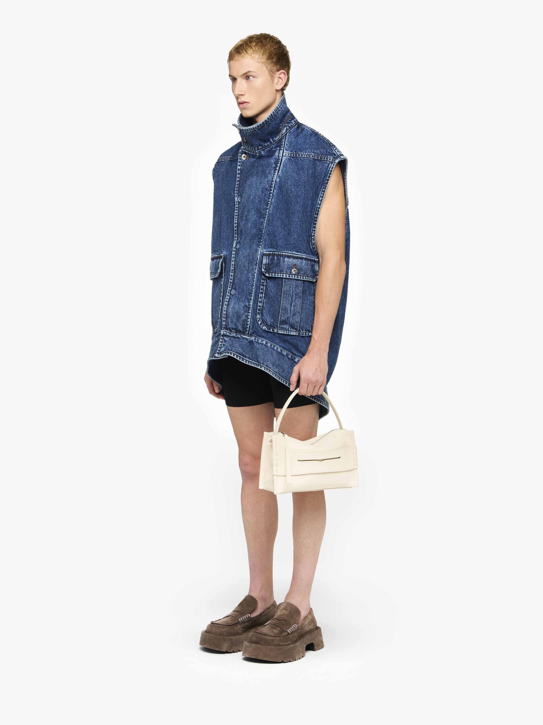 OVERSIZED SLEEVELESS HIGH NECK JACKET Product Image