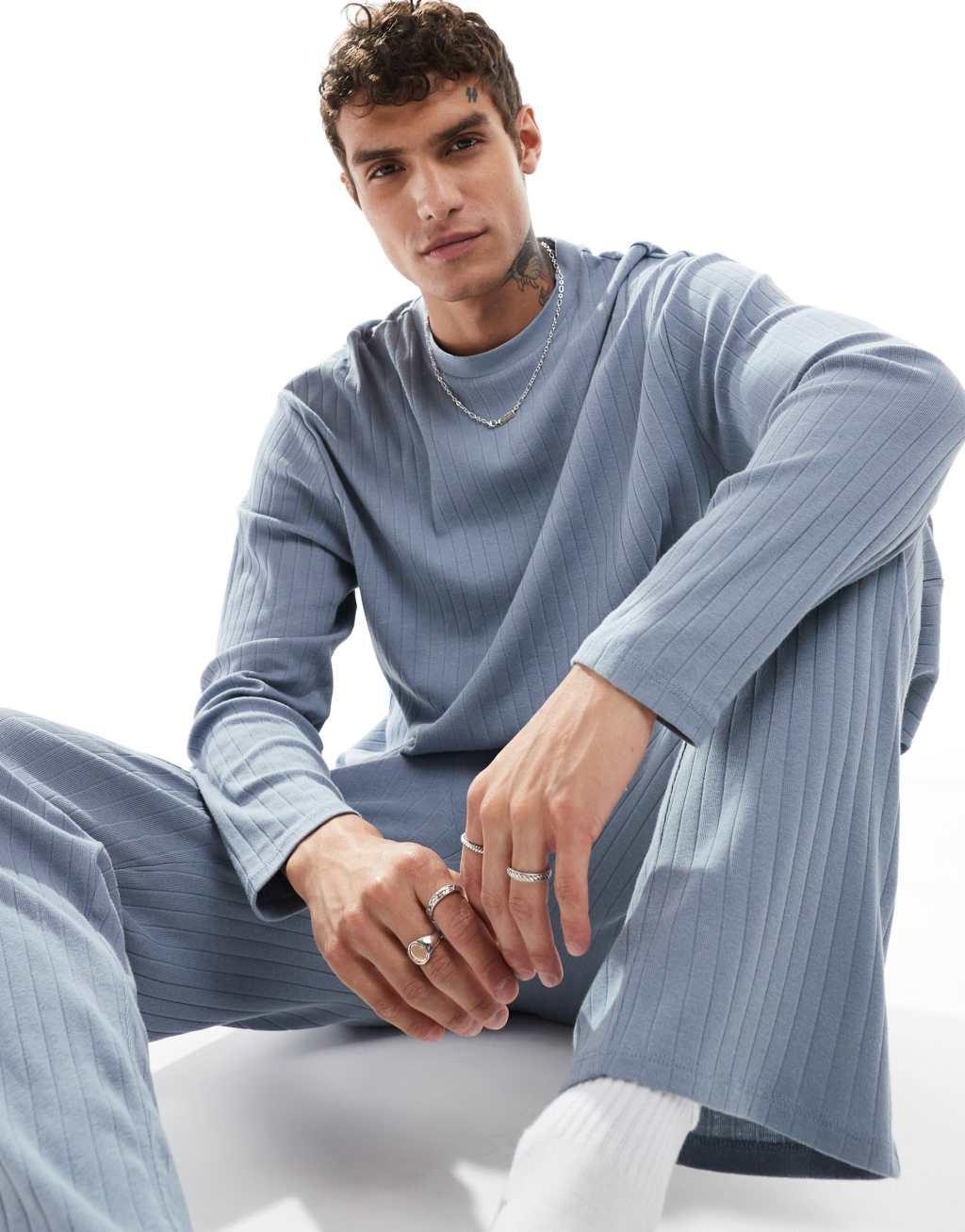 ASOS DESIGN rib lounge set with long sleeve t-shirt and bottoms in blue Product Image