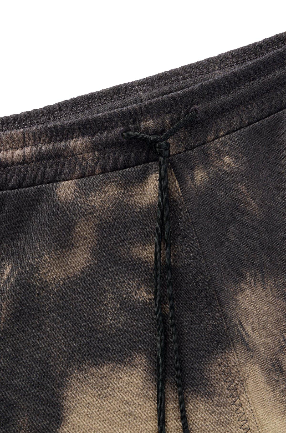 Cotton-terry relaxed-fit shorts with logo print Product Image