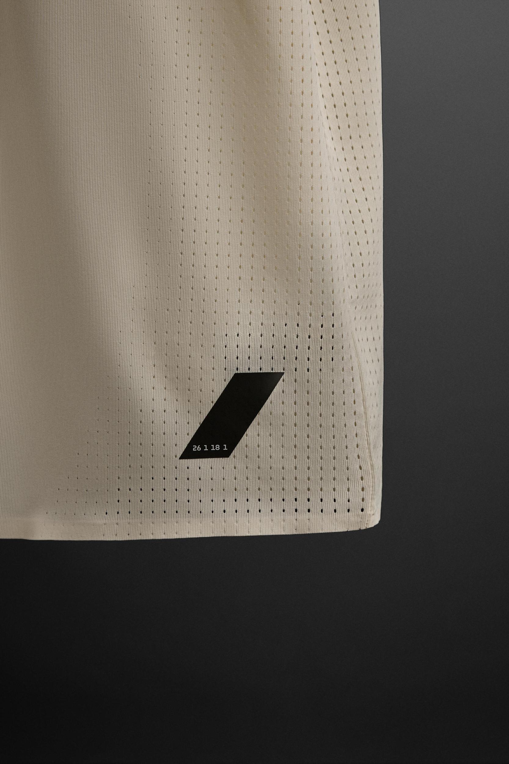 OPEN KNIT STRUCTURE T-SHIRT Product Image