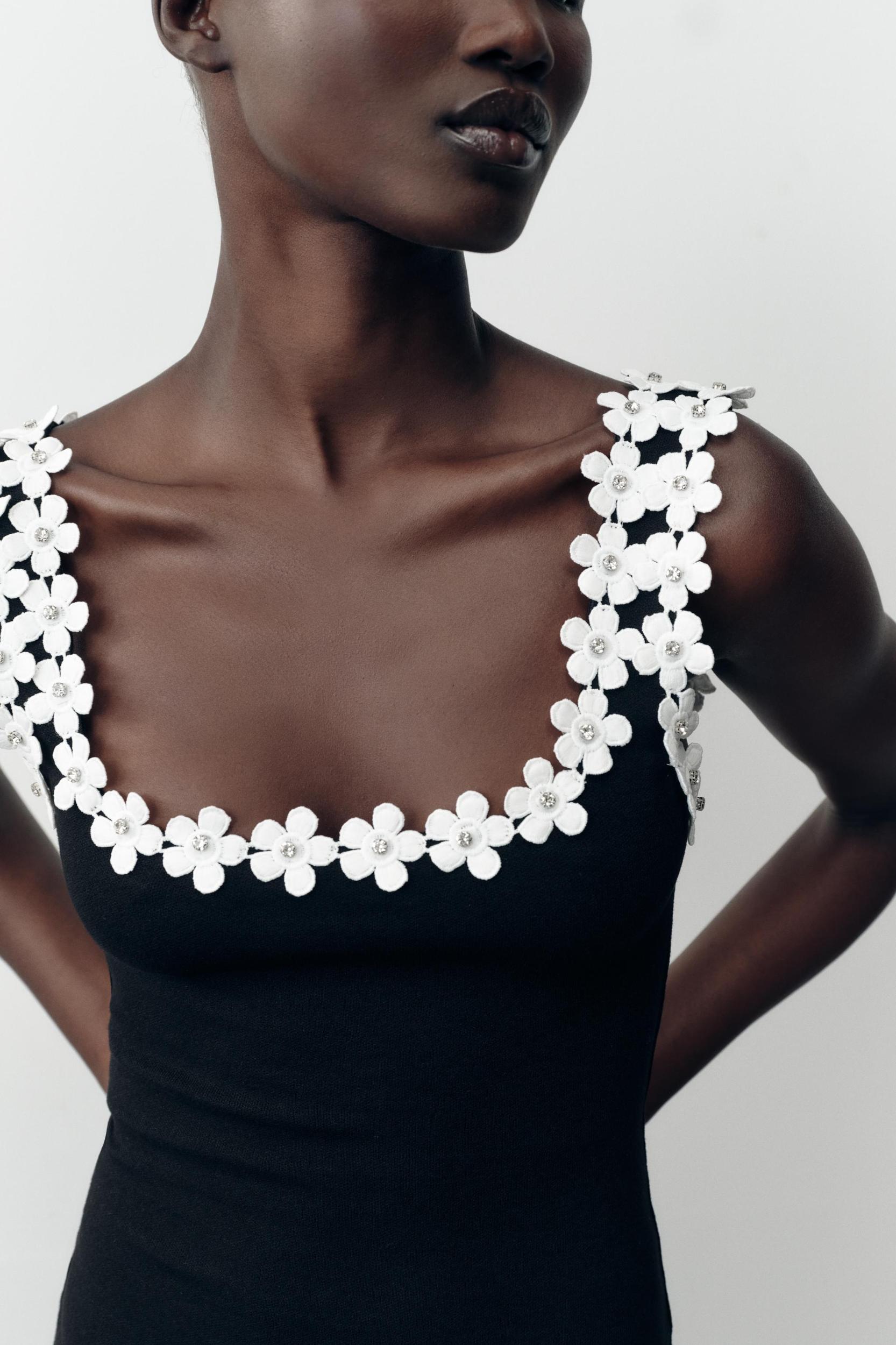 STRETCH DRESS WITH FLOWER HARDWARE Product Image