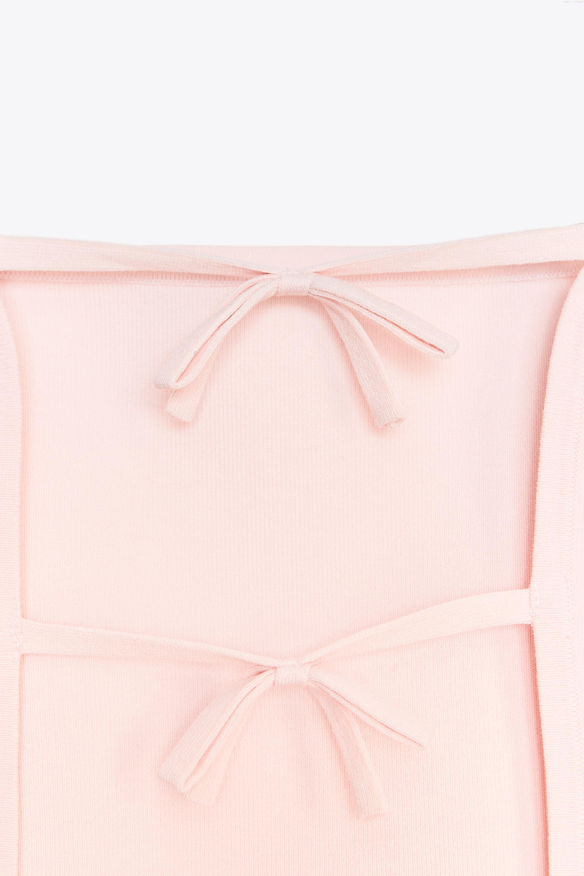 TIE CUT OUT KNIT TOP Product Image