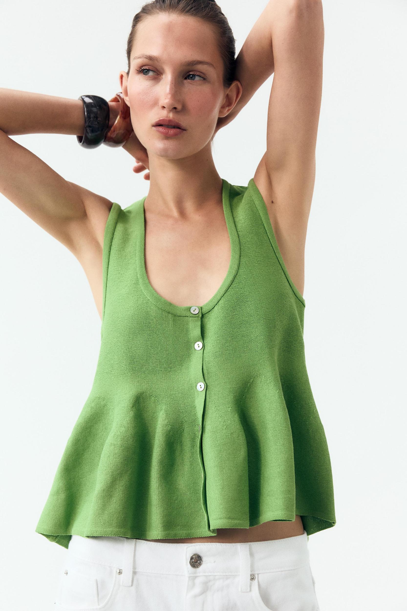 KNIT PEPLUM TOP Product Image