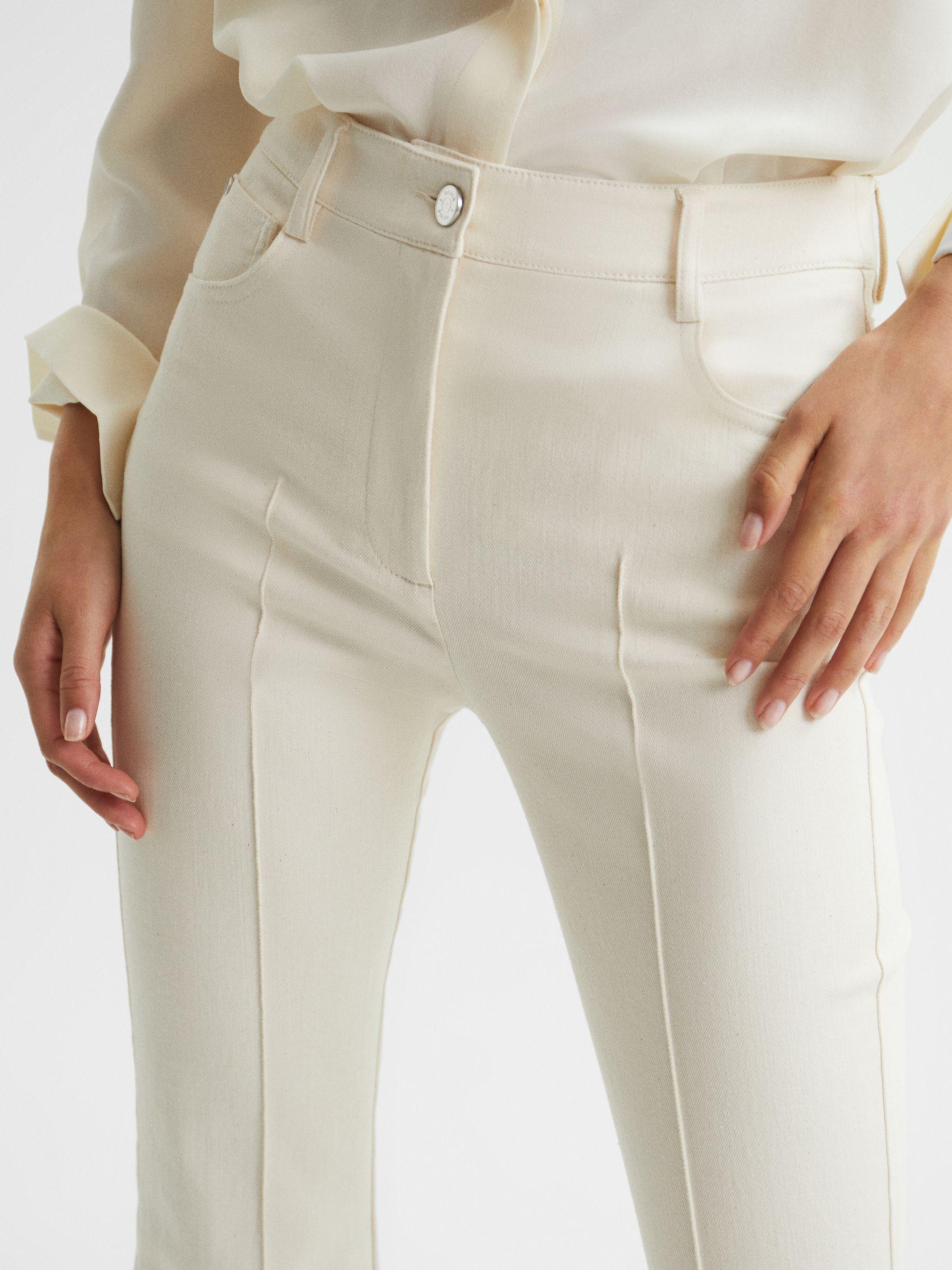 High Rise Flared Trousers in Cream Product Image