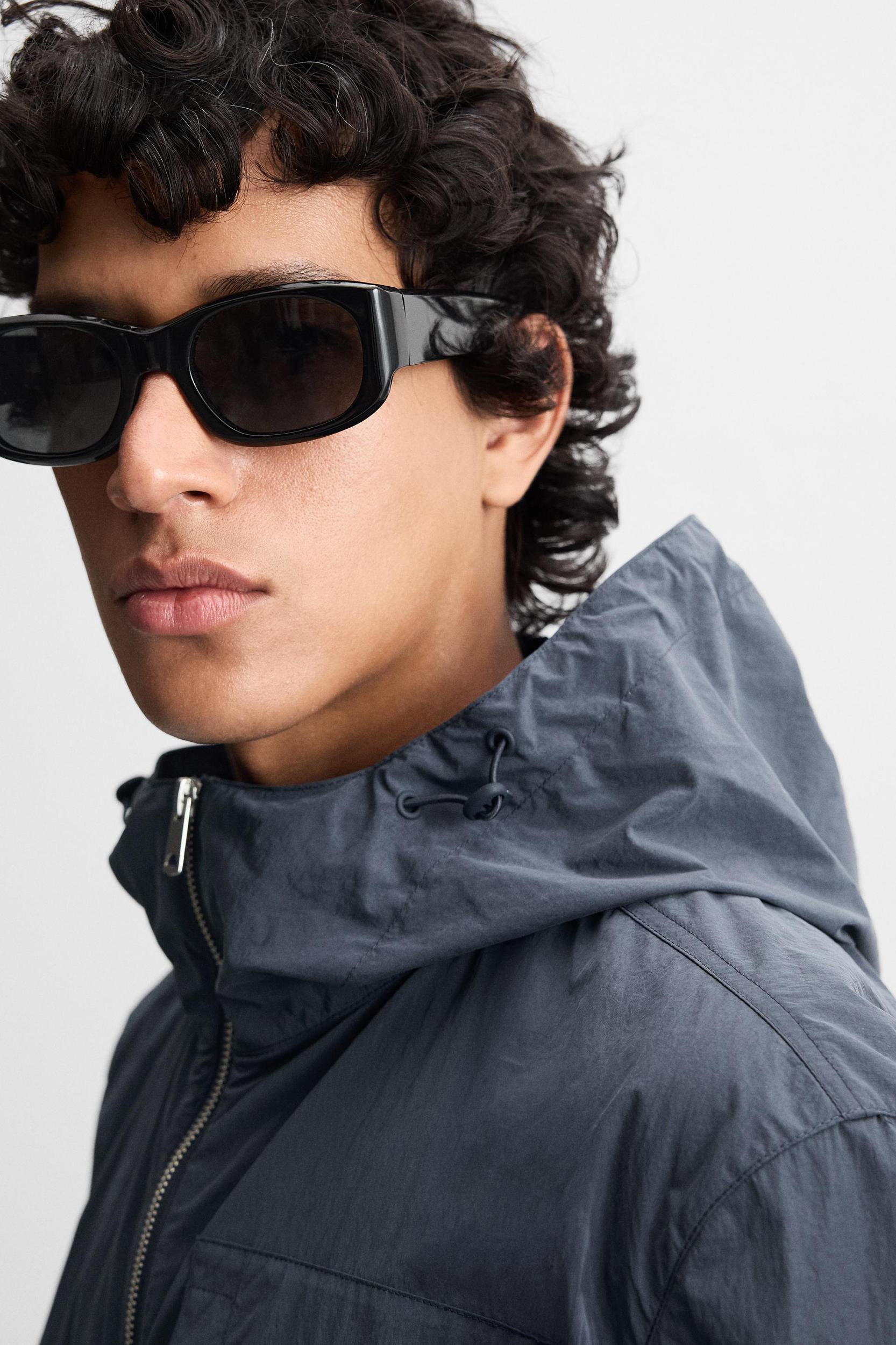 HOODED TECHNICAL JACKET Product Image