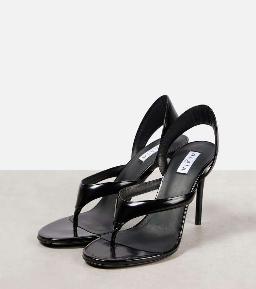 ALAÏA Leather Thong Slingback Sandals In Noir Product Image