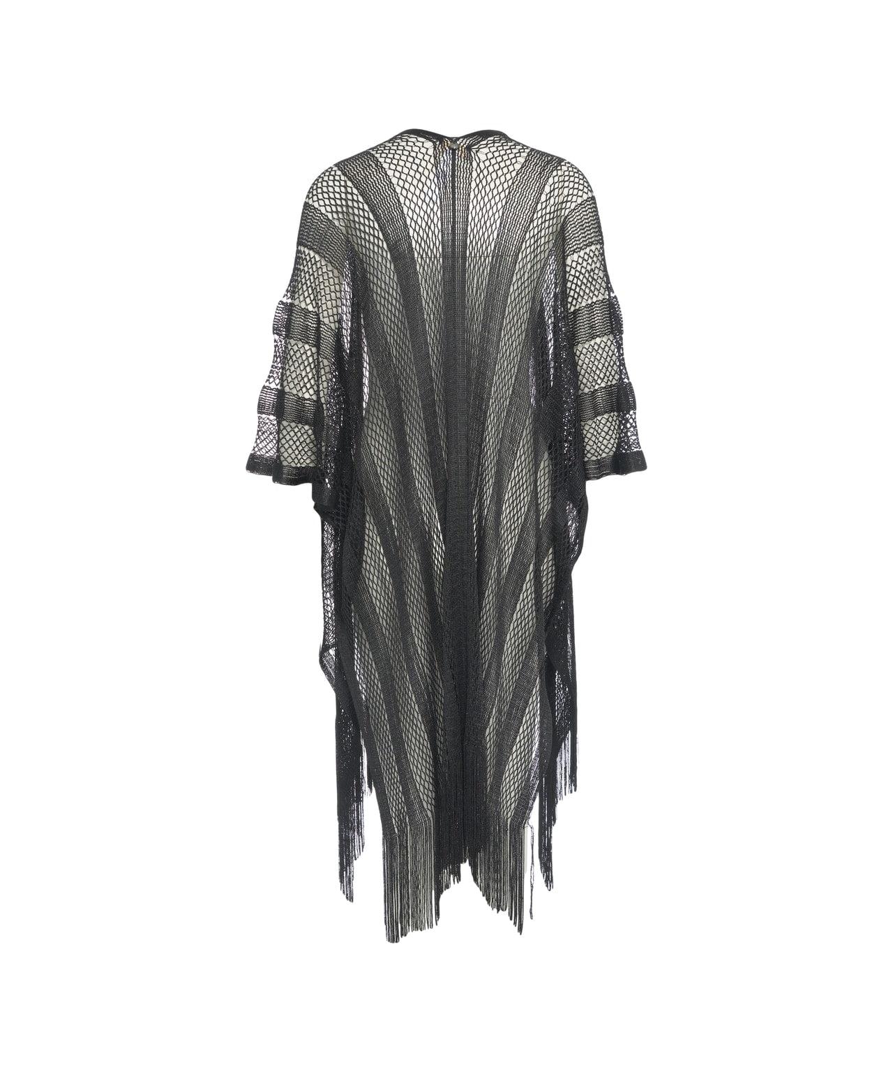 Poncho with fringes Product Image