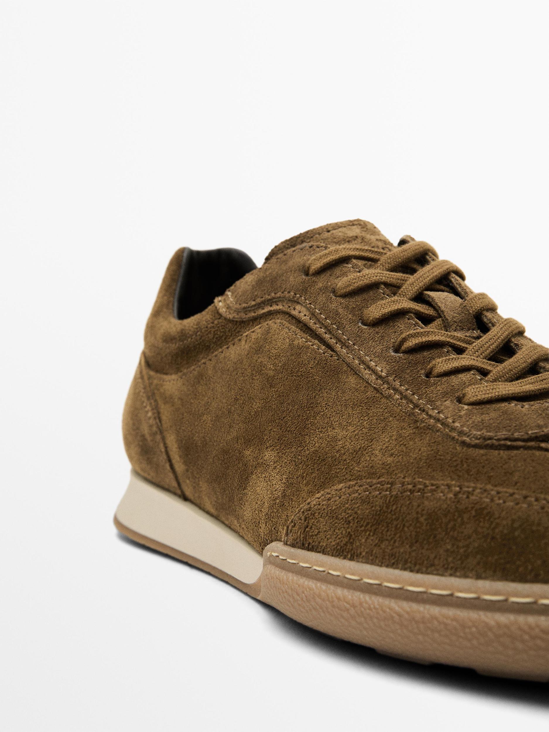 Split leather trainers with contrast soles Product Image