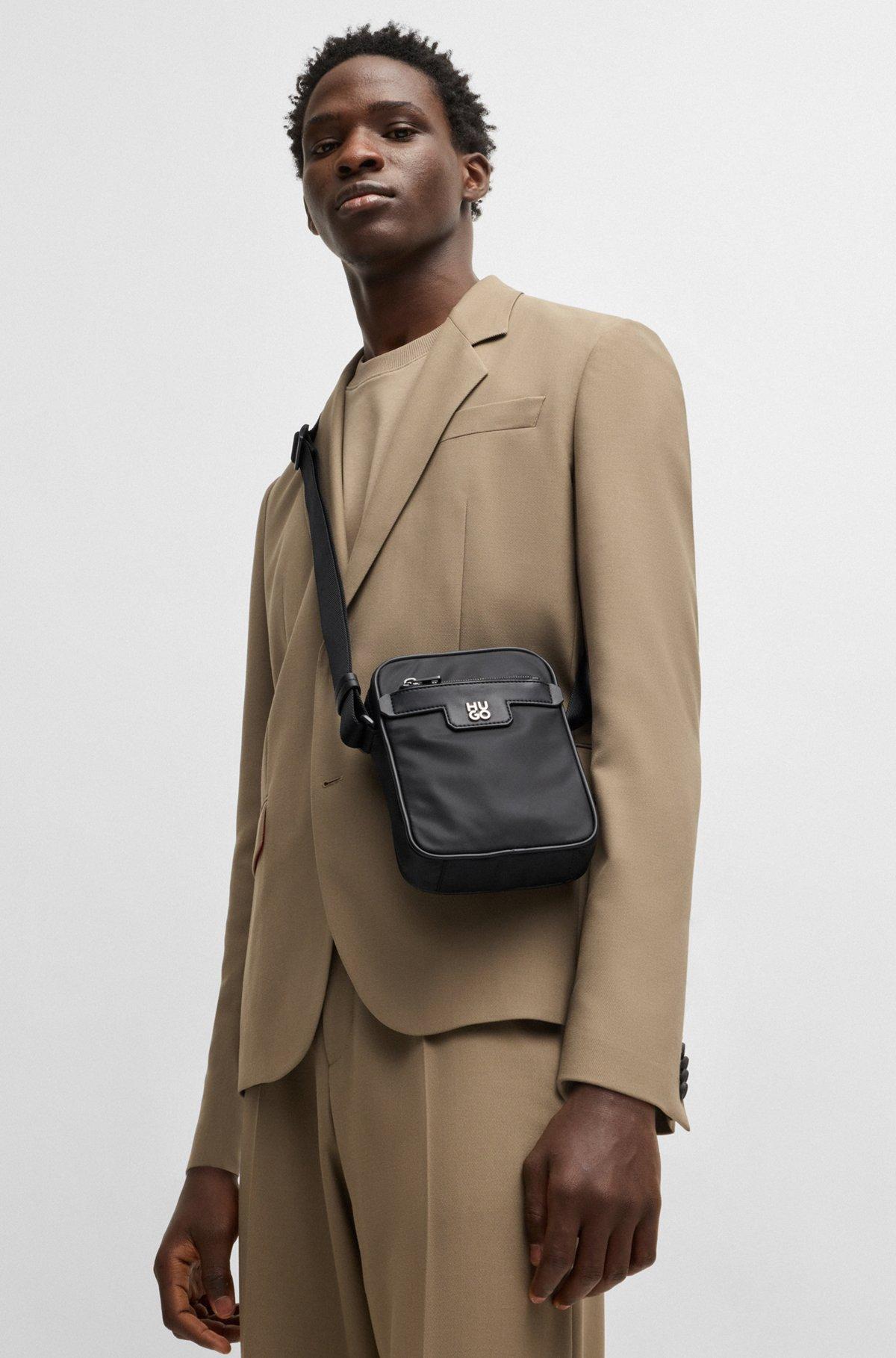 Reporter bag in structured twill with metallic stacked logo Product Image