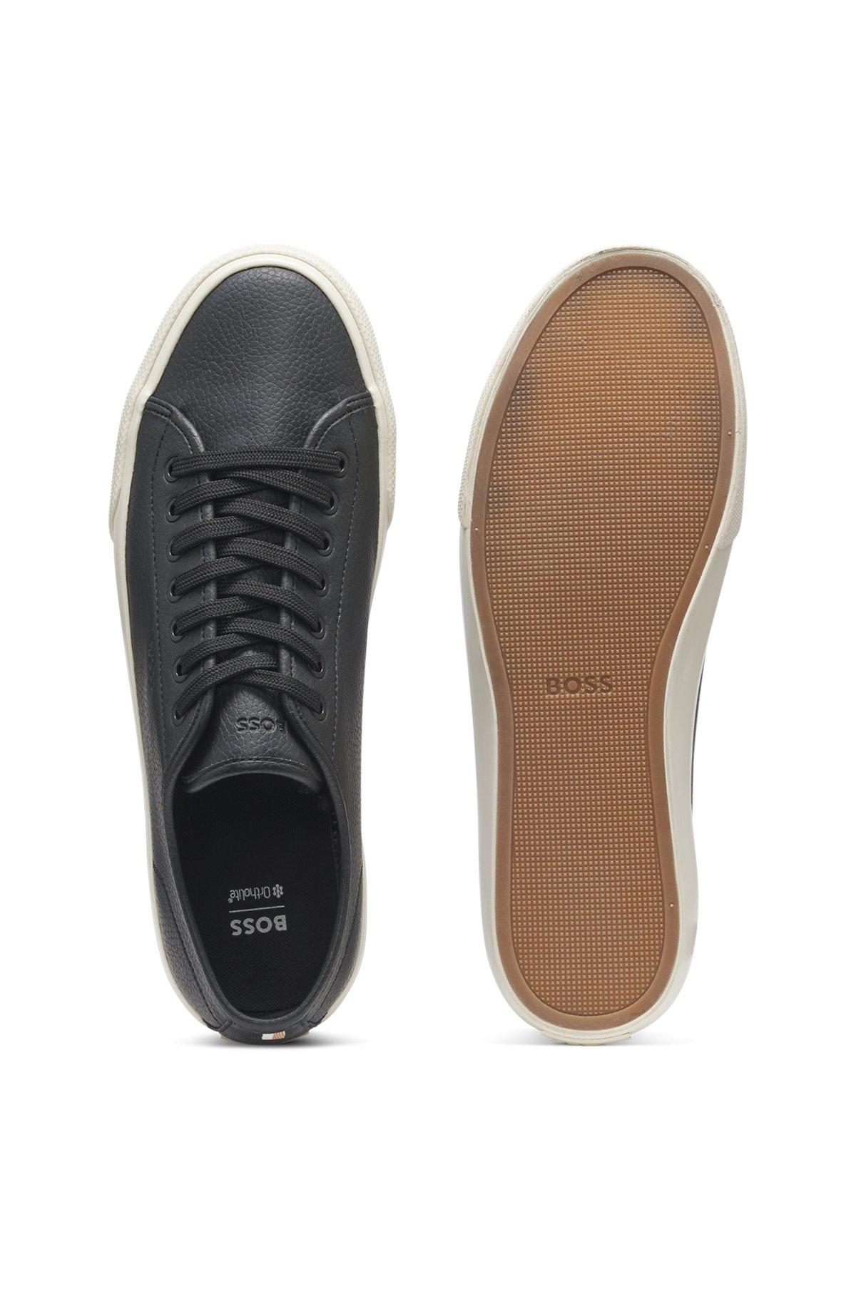 Low-top trainers in grained faux leather Product Image